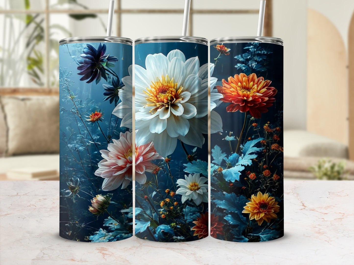Three tall tumblers with a vibrant floral pattern featuring dahlias and foliage.