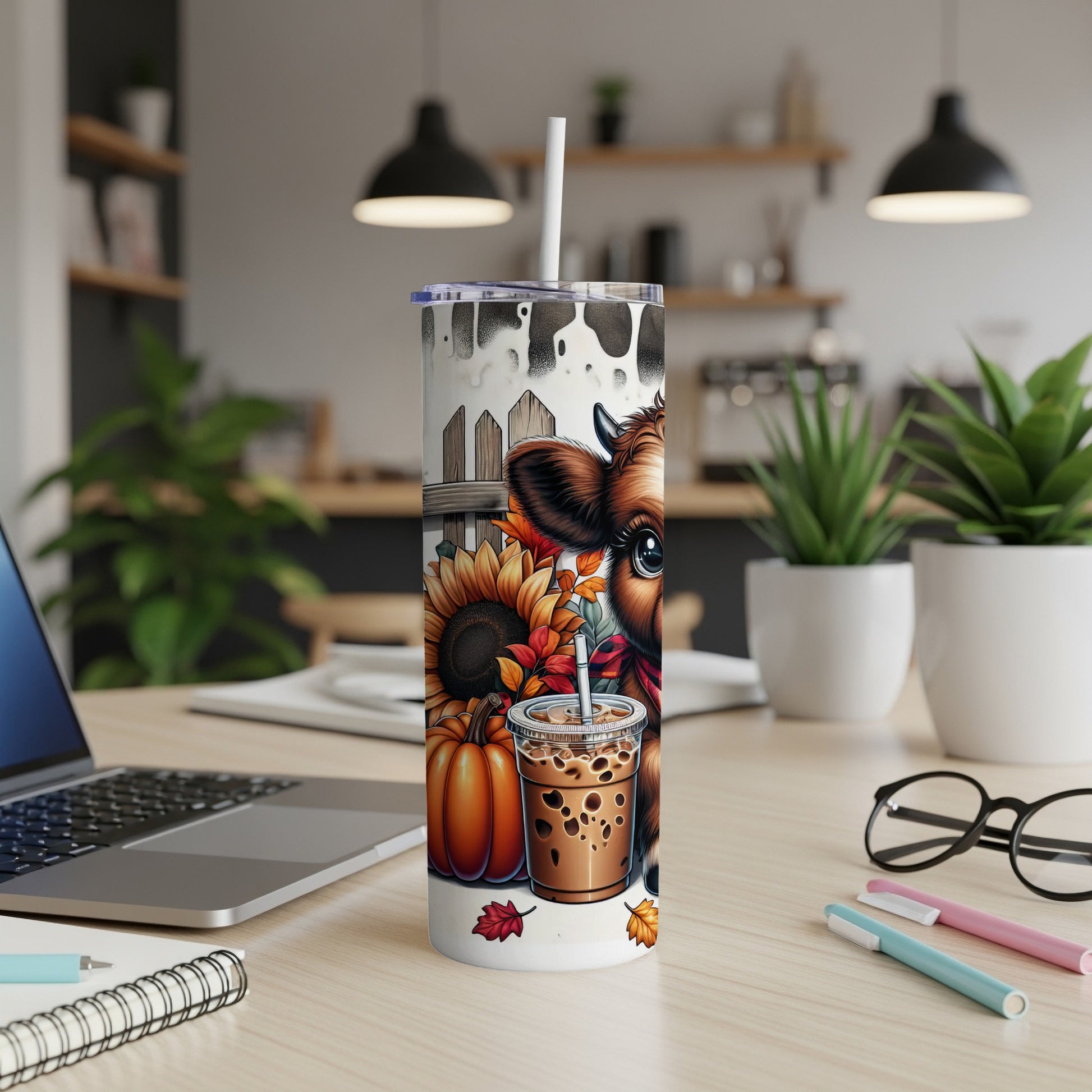 Cow and pumpkin tumbler with autumn leaves and sunflowers.