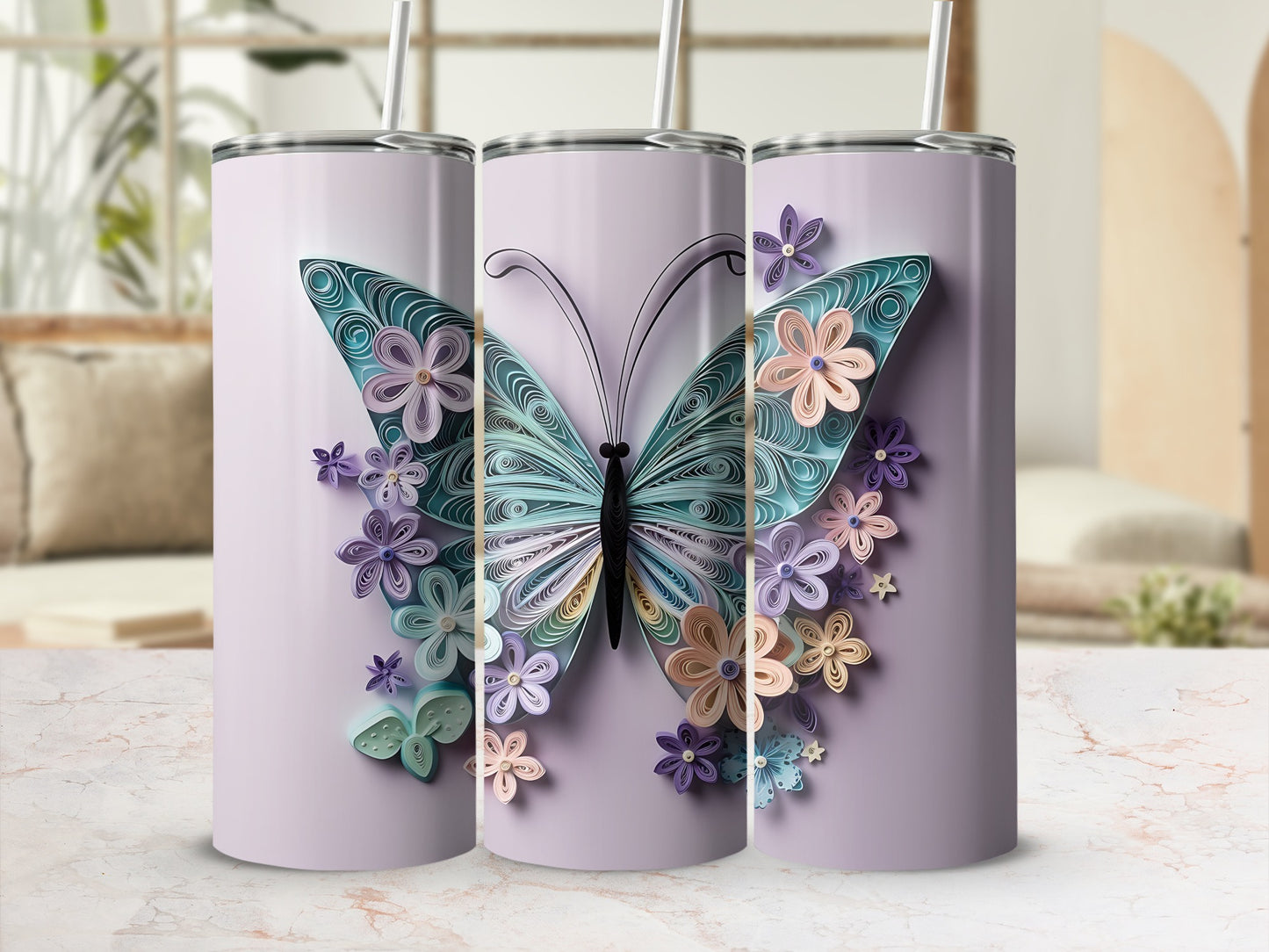 Three tumblers with a purple background and a quilled butterfly and flowers design.