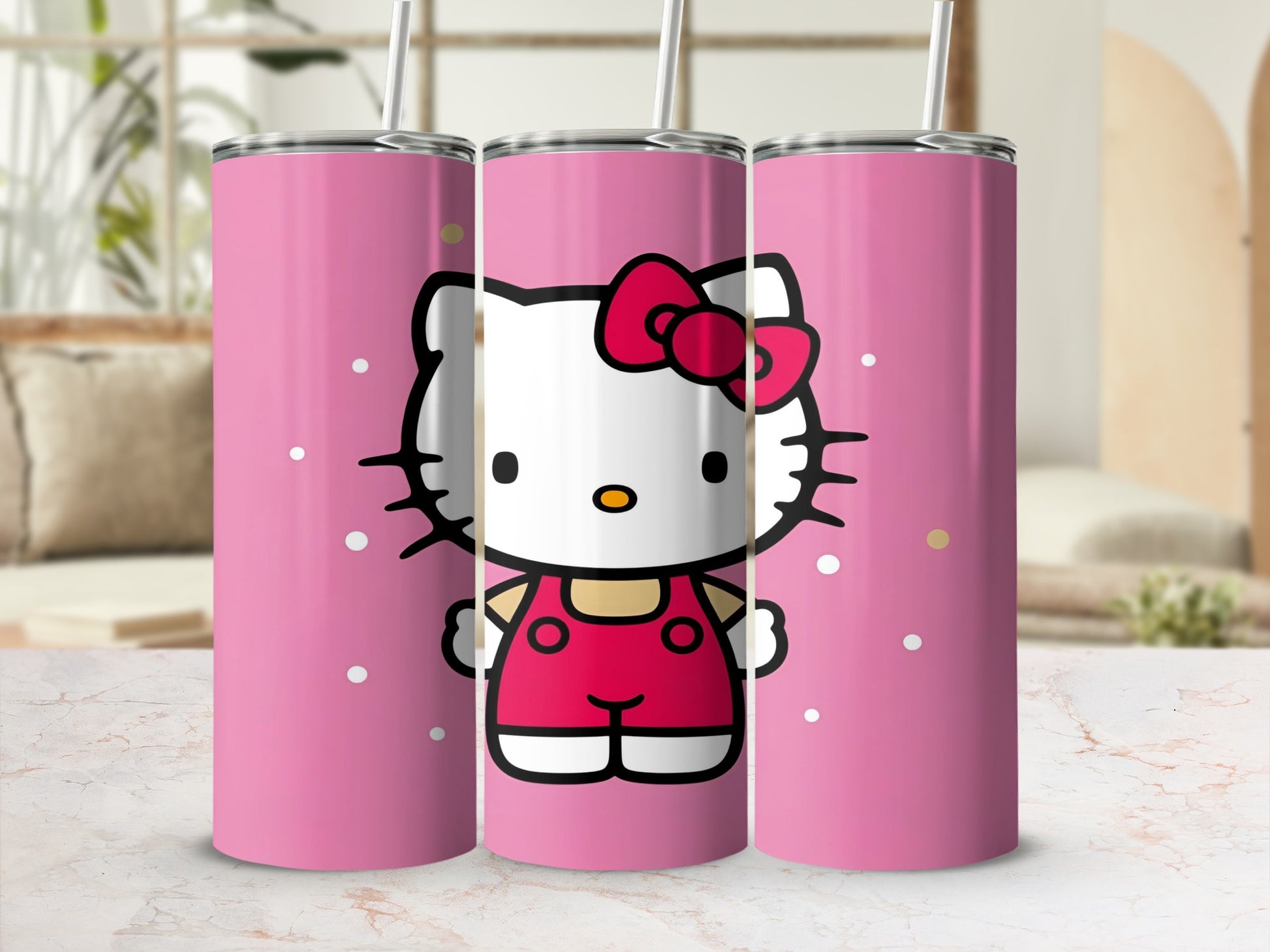 Pink tumbler with Hello Kitty in a red jumpsuit and straw.