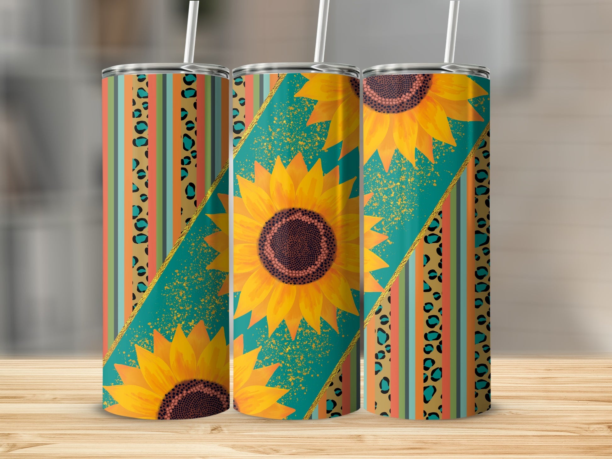 Three tumblers with sunflowers and leopard print patterns.