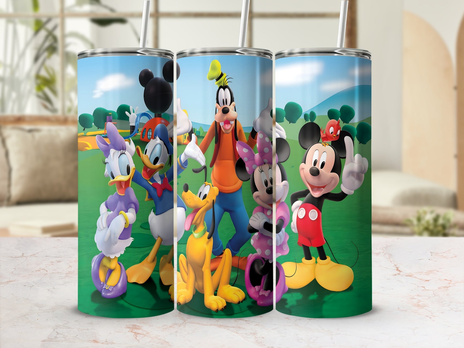 Mickey, Minnie, Donald, Daisy, and Goofy characters on three tumblers.
