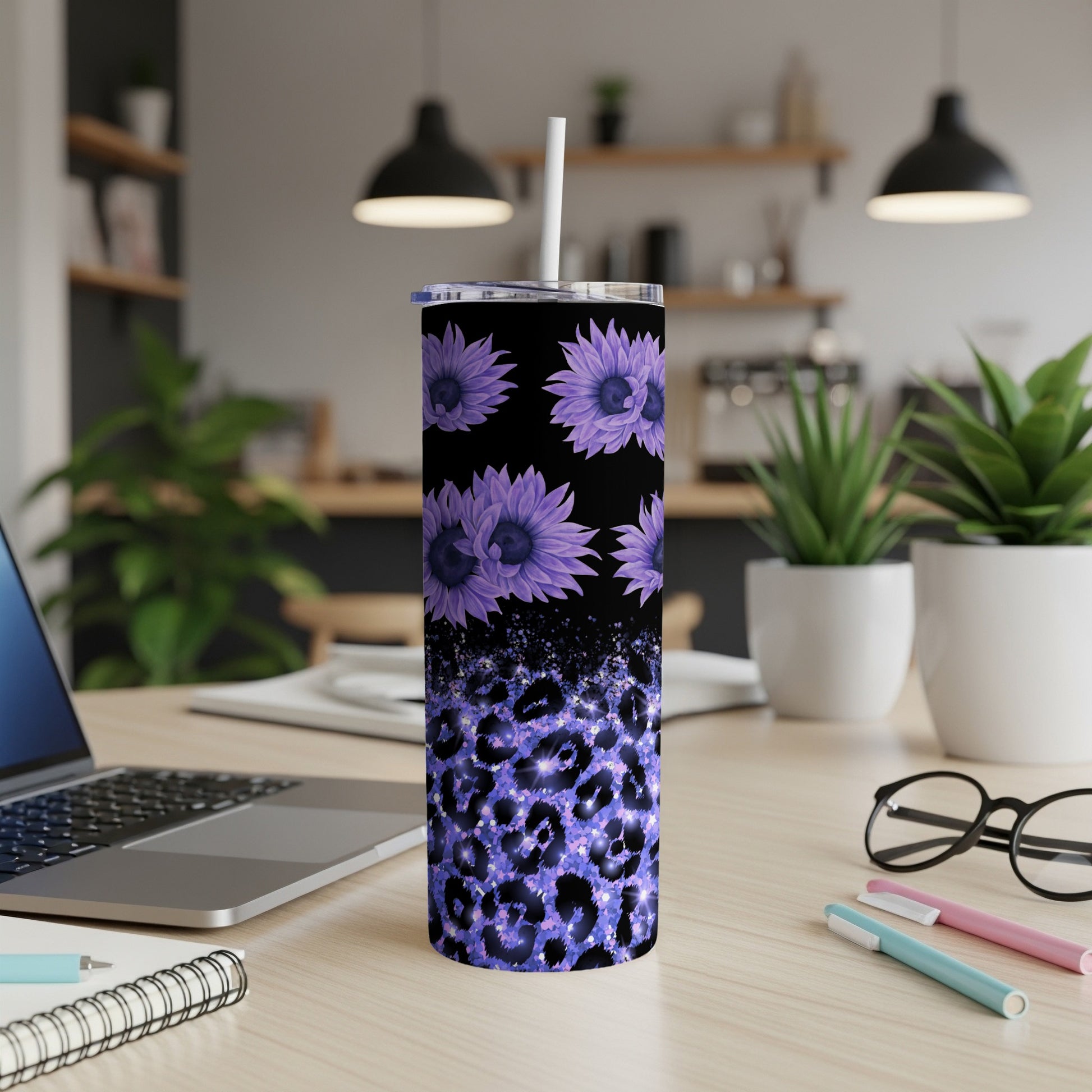 Black tumbler with purple flowers and blue leopard print.