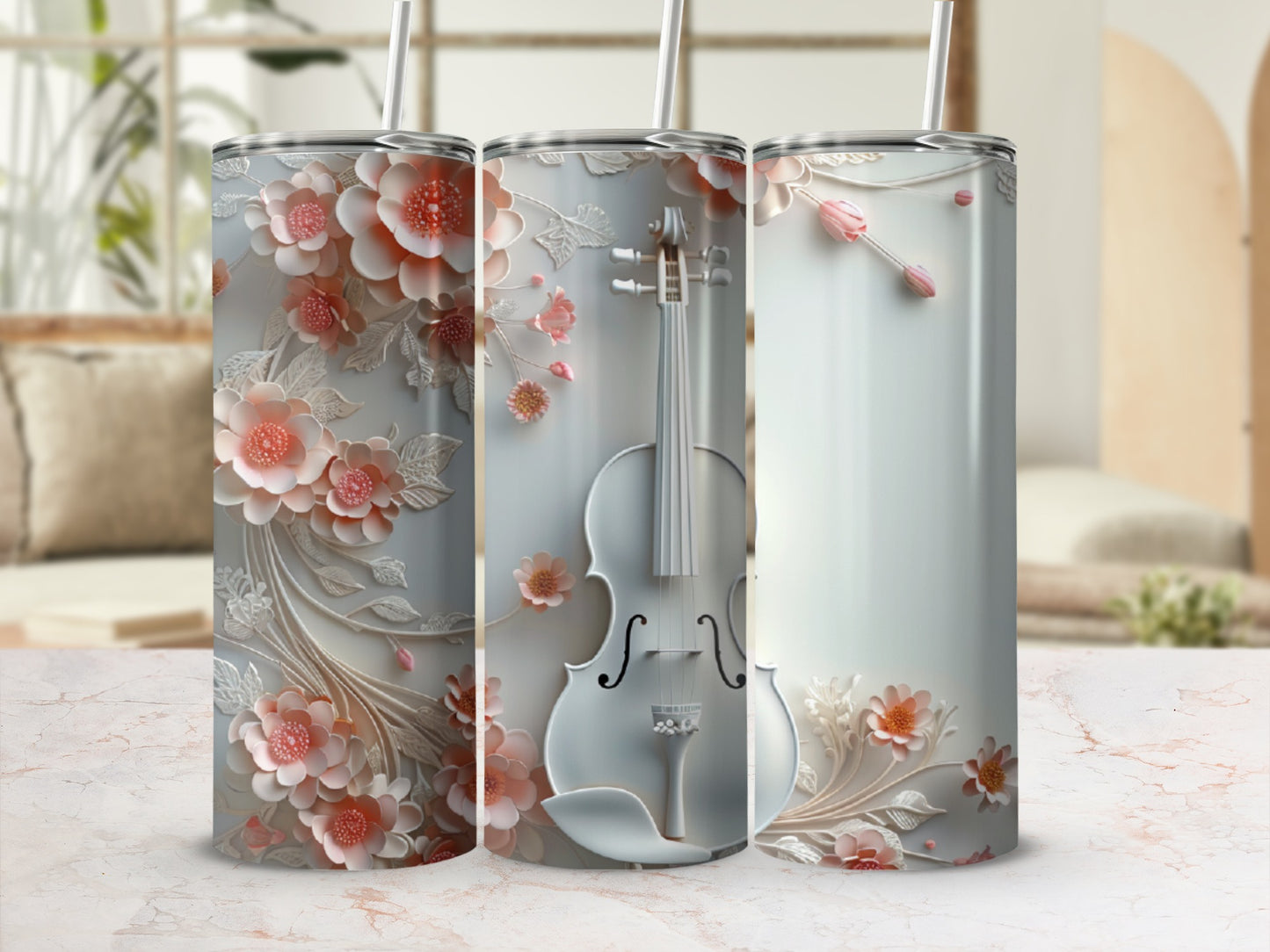 Three tumblers with floral and violin designs.