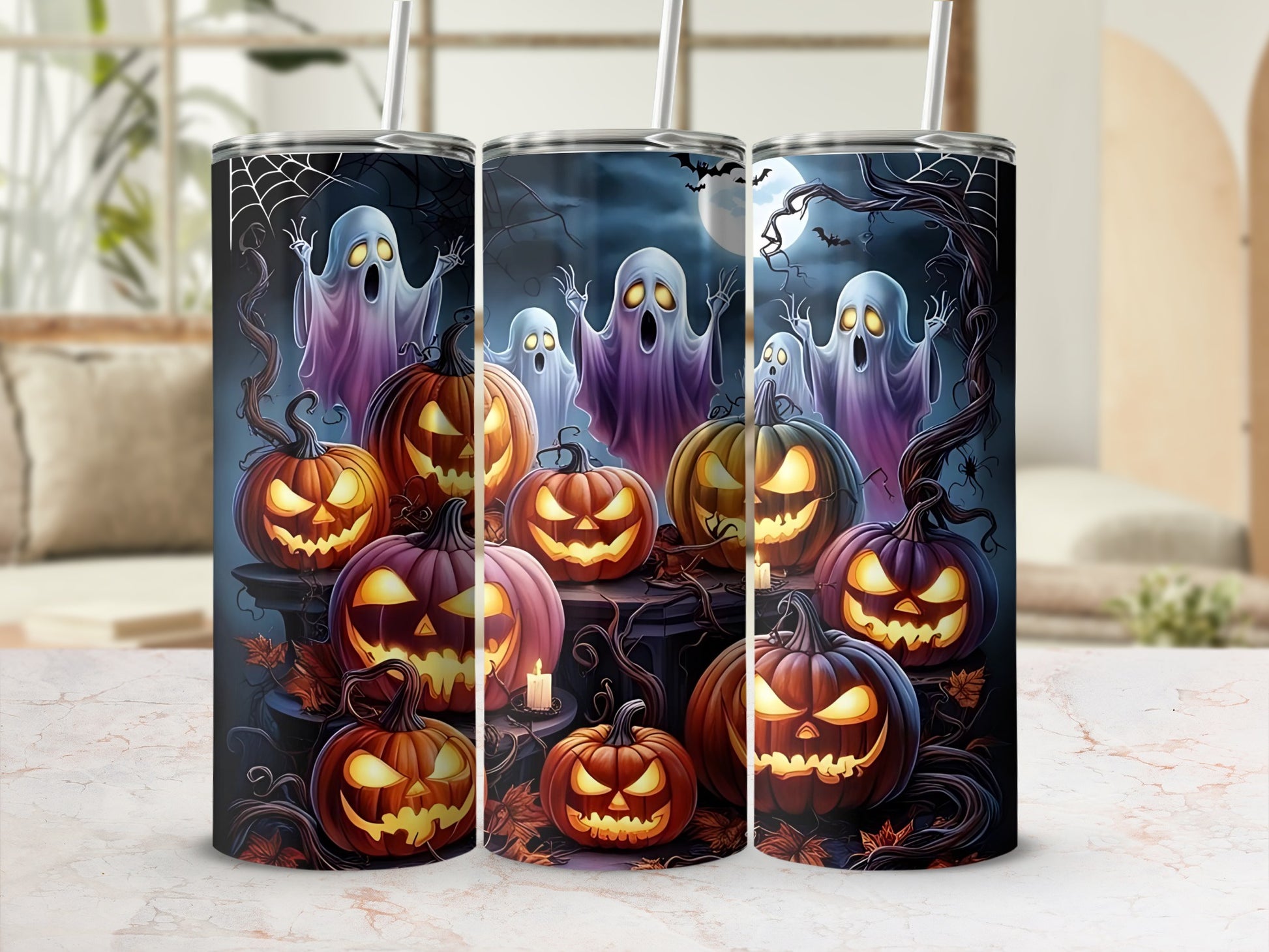 Halloween tumblers with glowing jack-o'-lanterns and spooky ghosts.