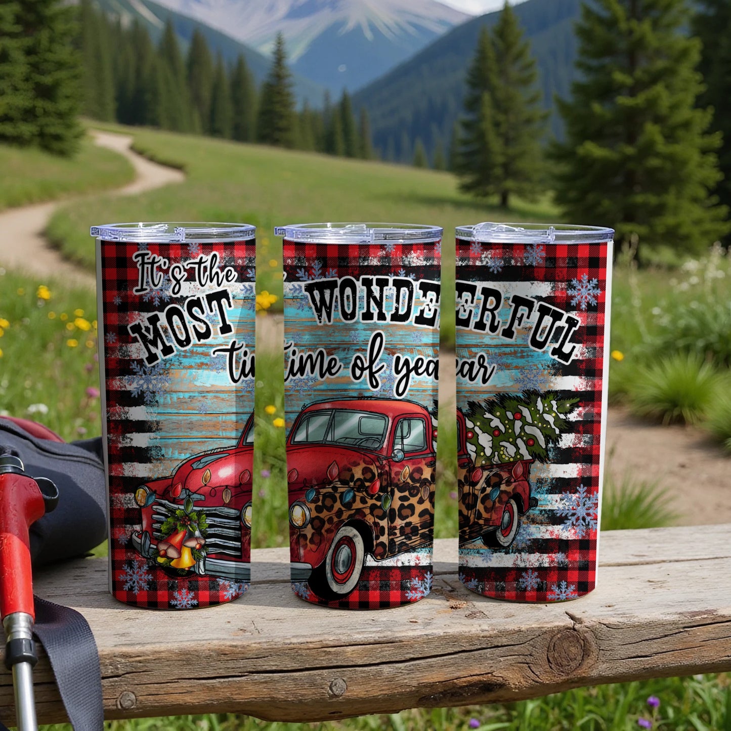 Three tumblers with red plaid, vintage truck, and Christmas tree designs.