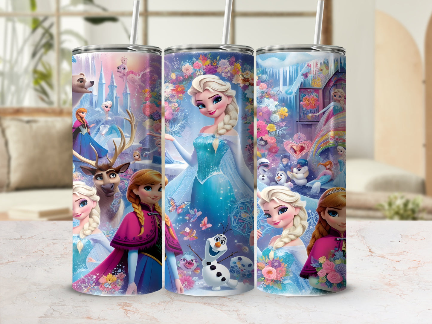 Three tumblers featuring Elsa from Frozen with Olaf and other characters.
