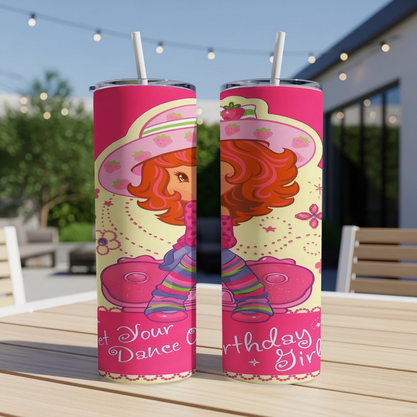 Strawberry Shortcake character on a pink tumbler with striped socks and "Birthday Girl" text.