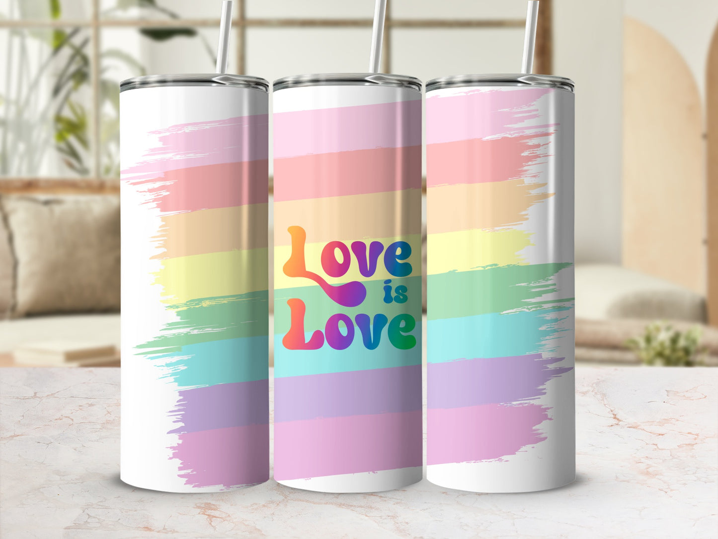 Rainbow striped tumbler with "Love is Love" text.