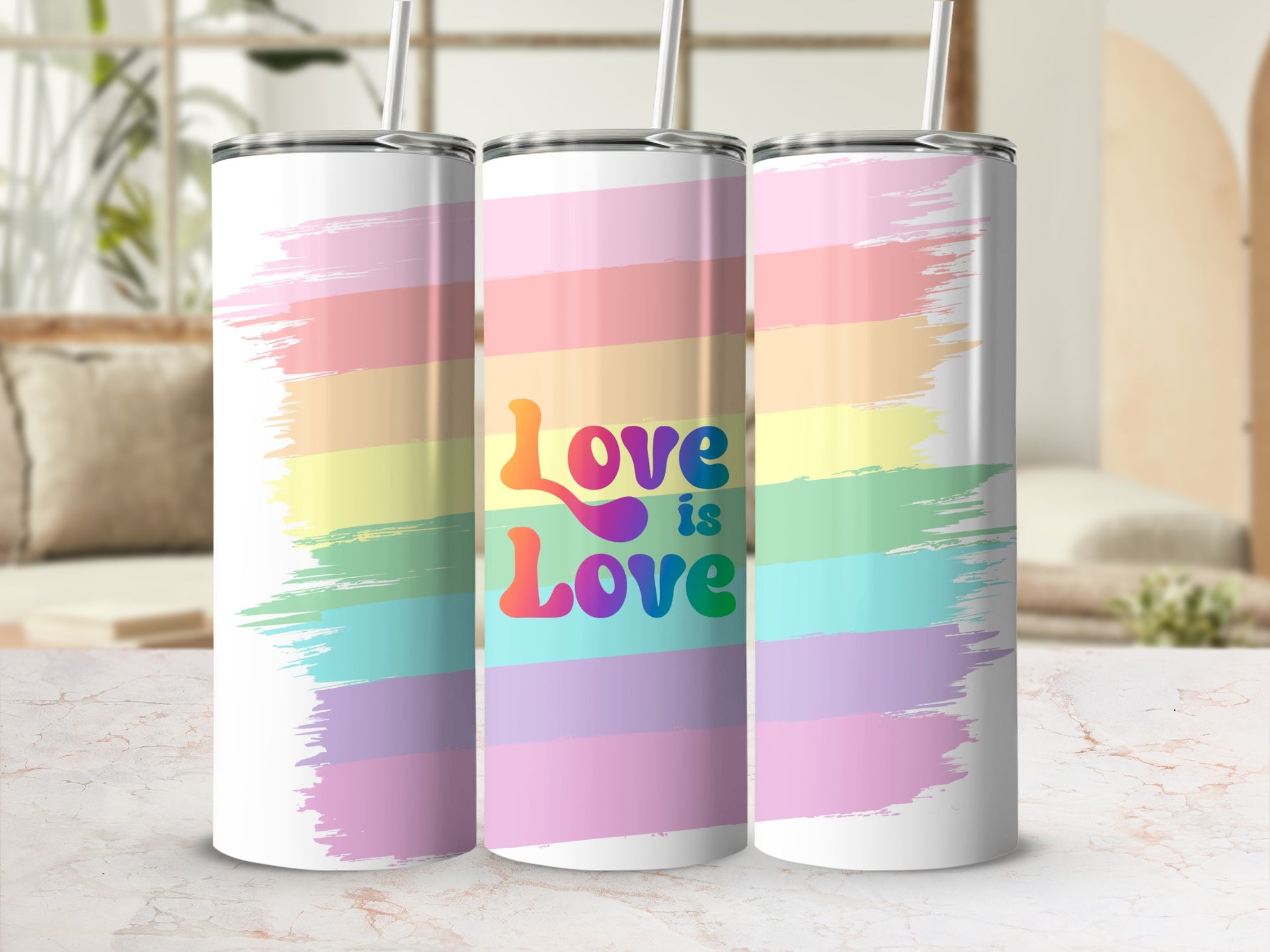 Rainbow striped tumbler with "Love is Love" text.