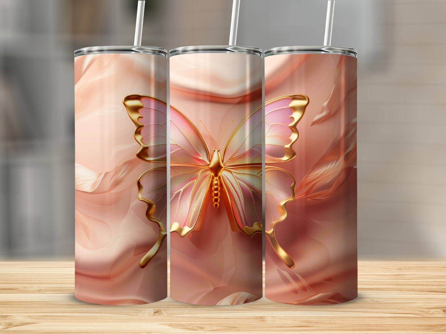 Pink and gold butterfly on flowing fabric tumbler set.