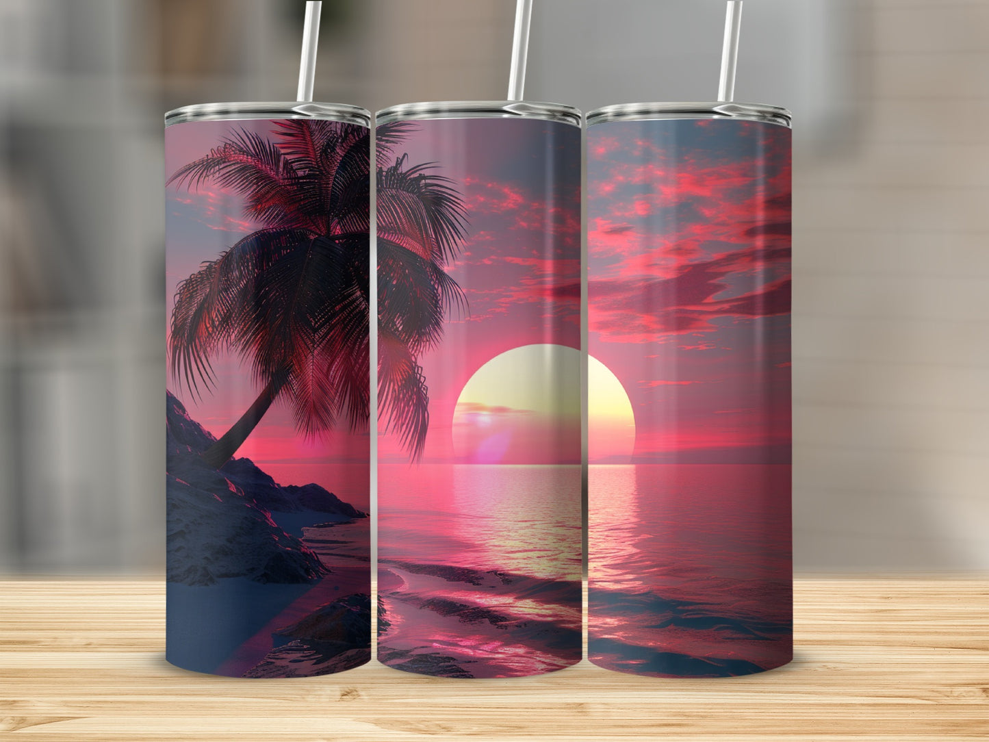 Three tumblers featuring a vibrant sunset over a tropical beach scene.