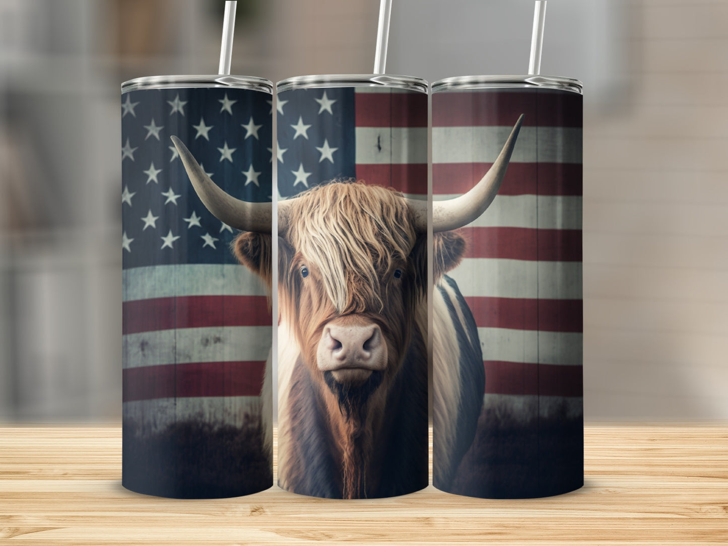 Highland cow with American flag pattern on three tumblers.
