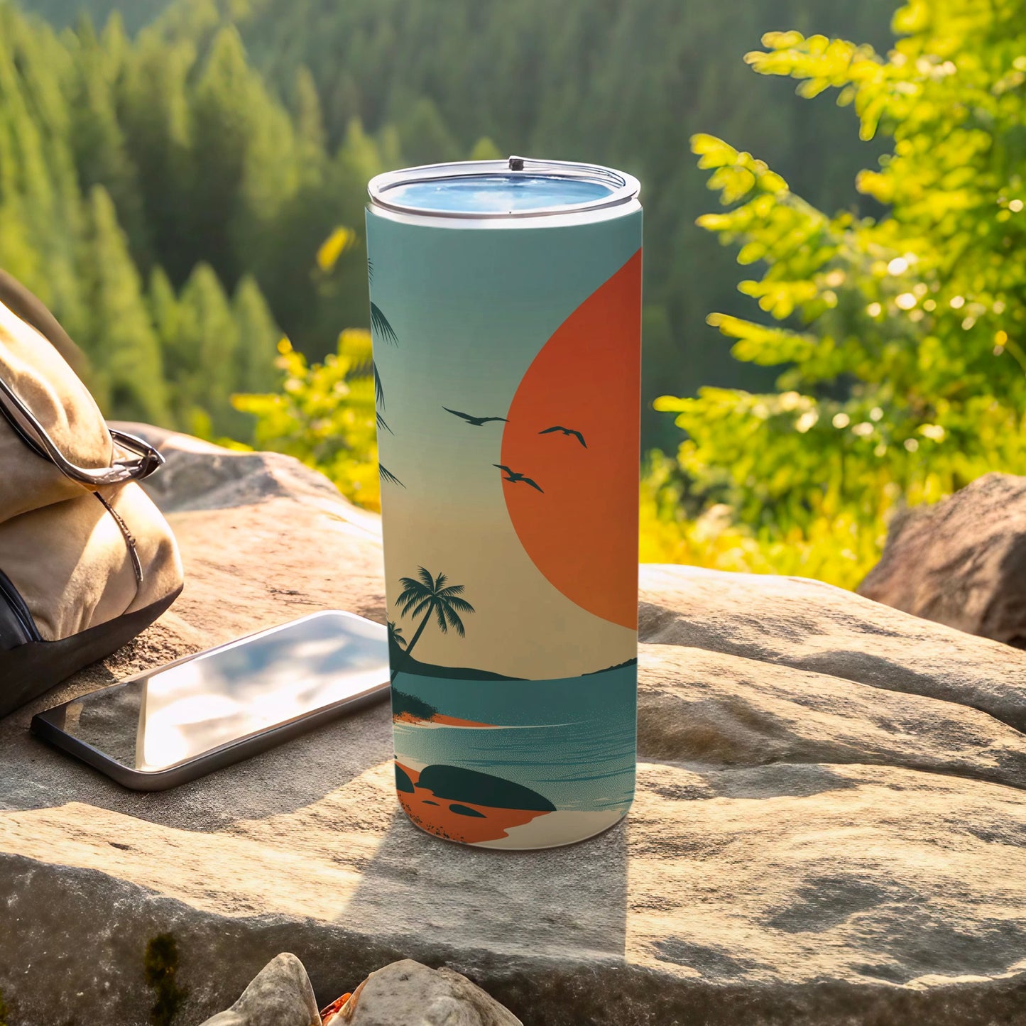 Sunset beach scene with palm trees on a blue insulated tumbler.