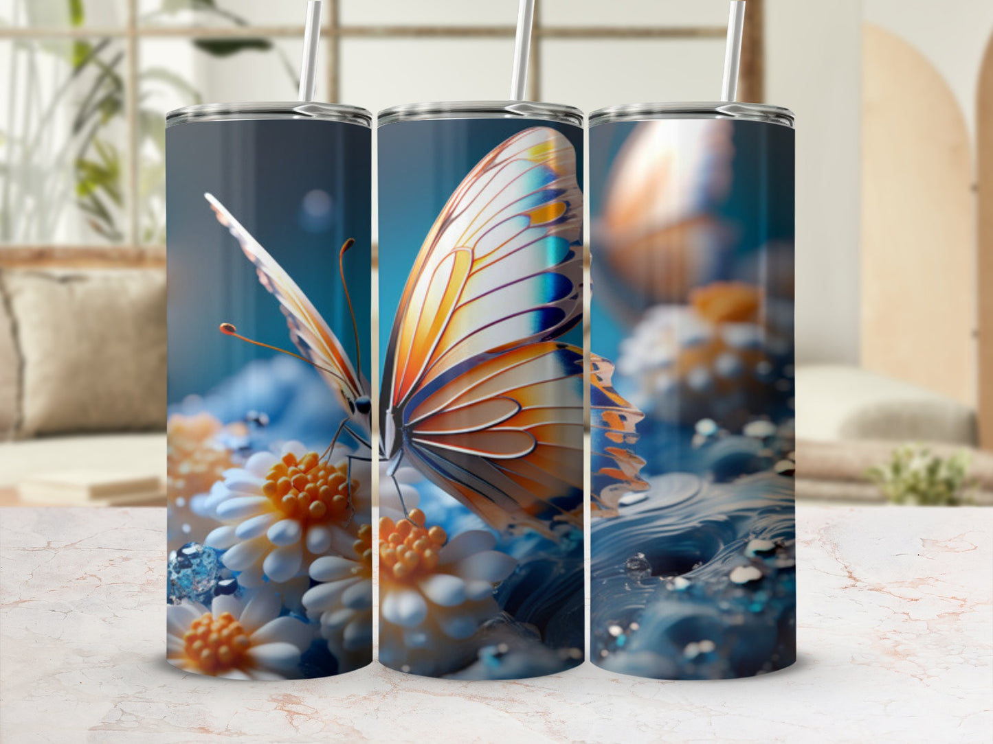 Butterfly and floral design on three tumblers with straws.