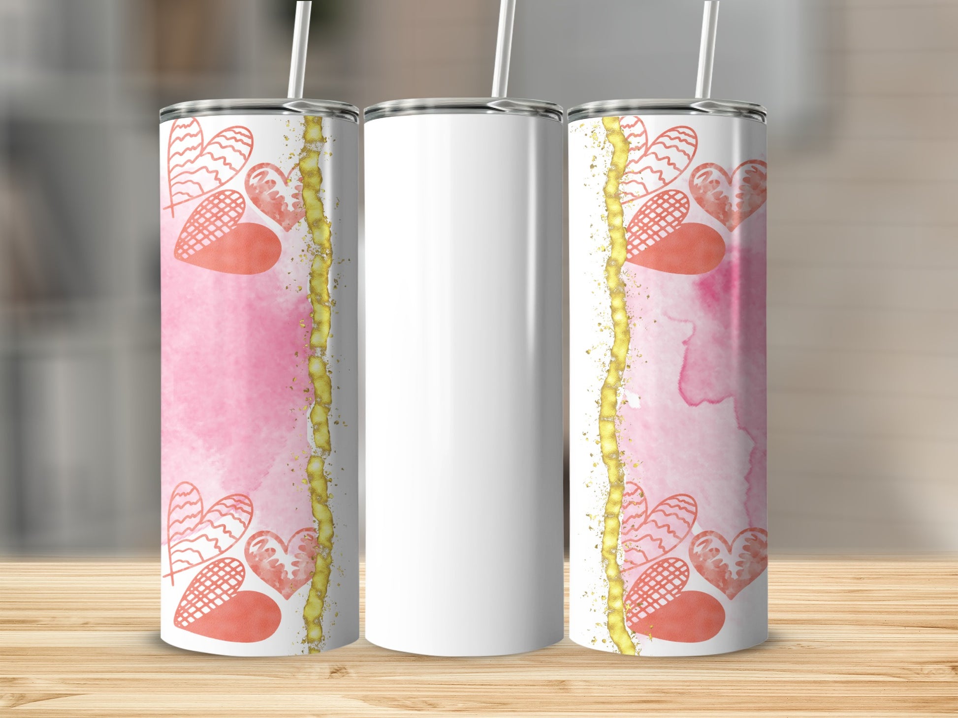 White tumbler with pink watercolor wash and heart designs.