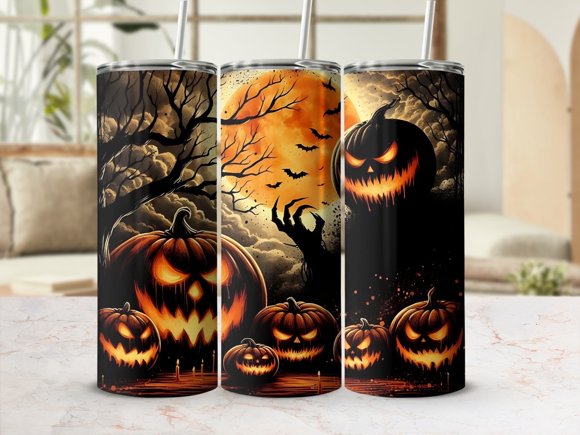 Three Halloween tumblers feature grinning jack-o'-lanterns and spooky trees against an orange moon.