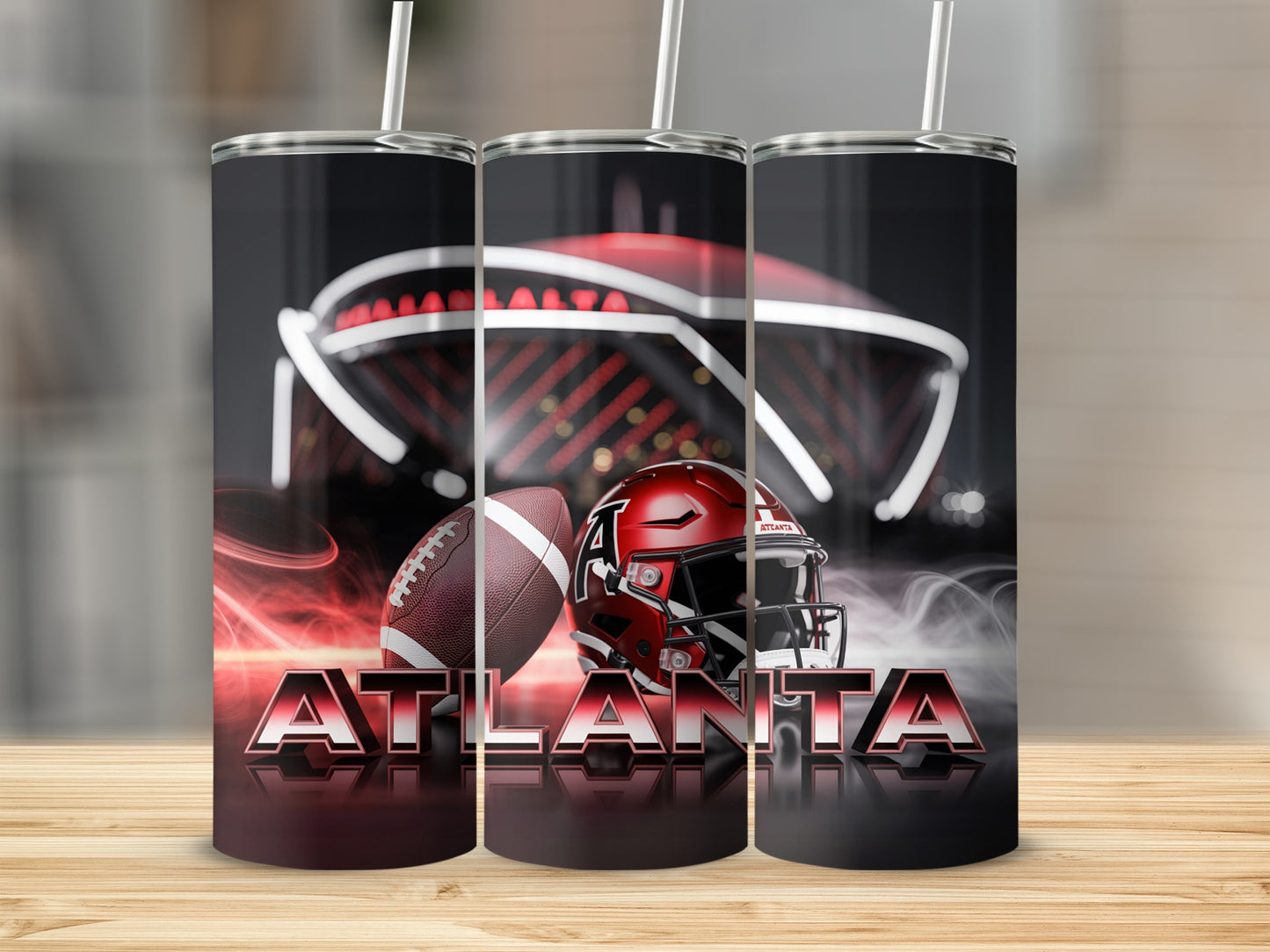 Atlanta Falcons football helmet and ball on stadium background, metal tumblers.