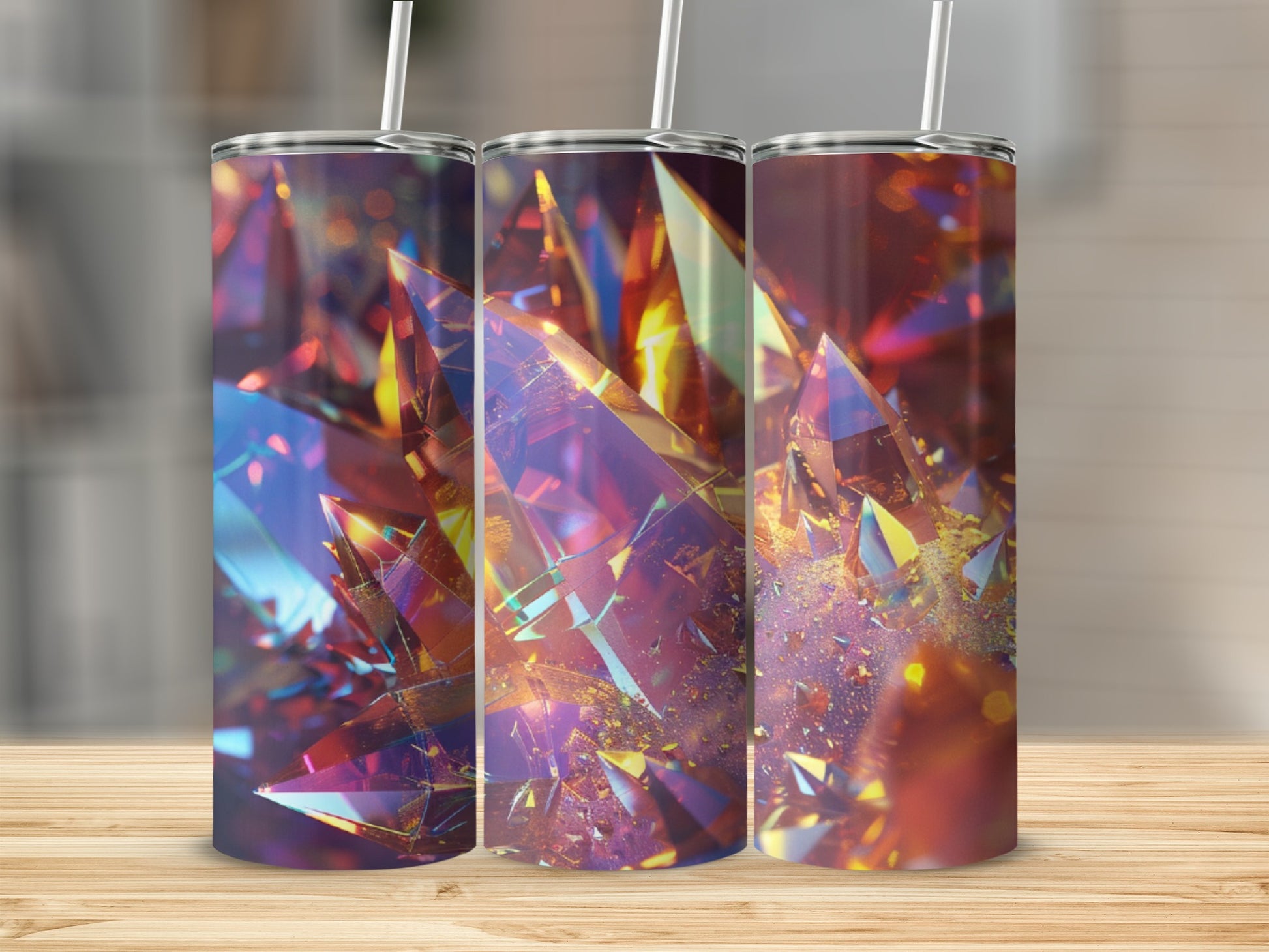 Three tumblers with a colorful abstract crystal design.
