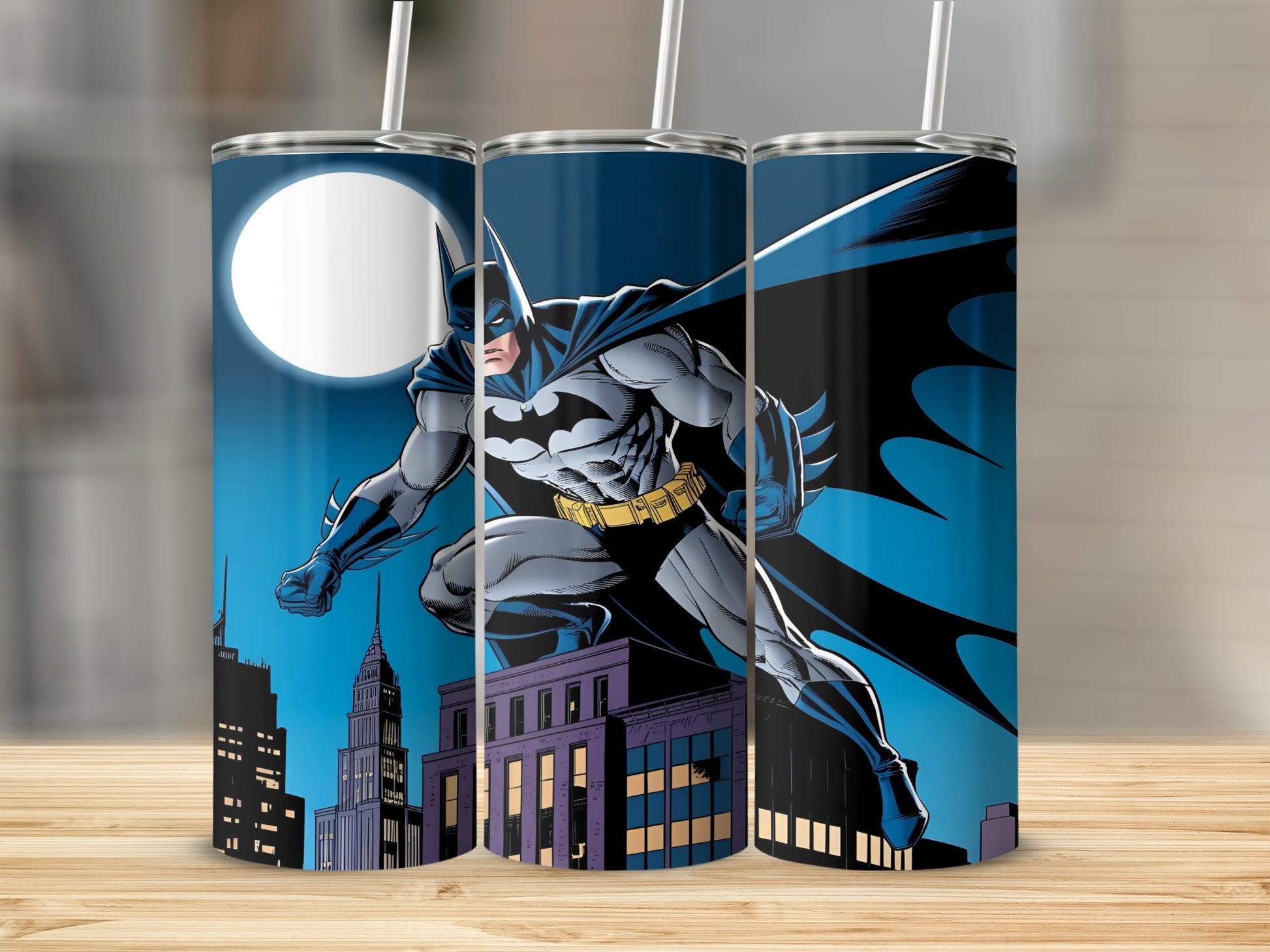 Batman on a rooftop at night with city buildings and a full moon.