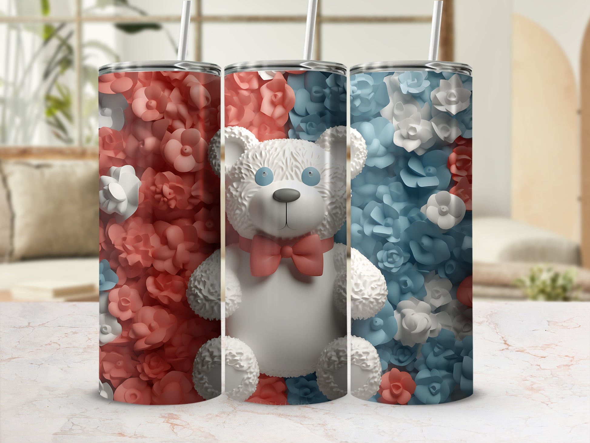 Teddy bear tumbler with floral design in pink and blue.