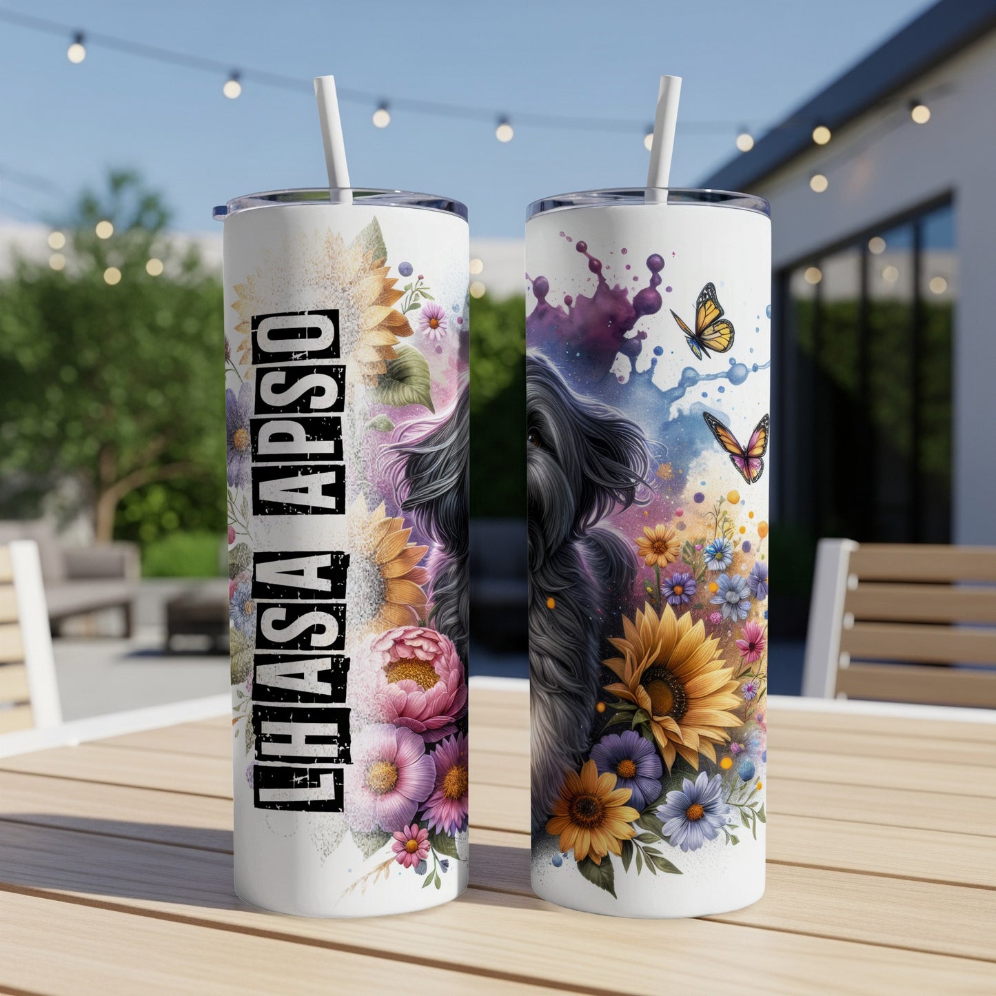 Two Lhasa Apso tumblers with floral and butterfly designs, one with text.