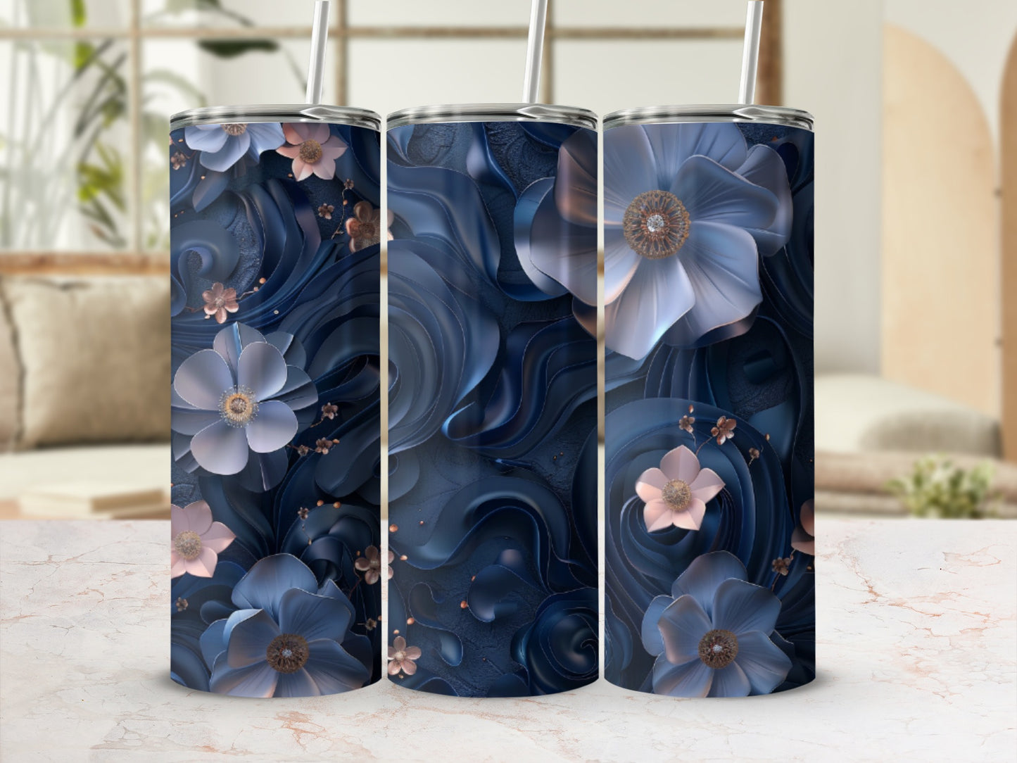 Three tumblers with embossed floral designs in blue and pink hues.