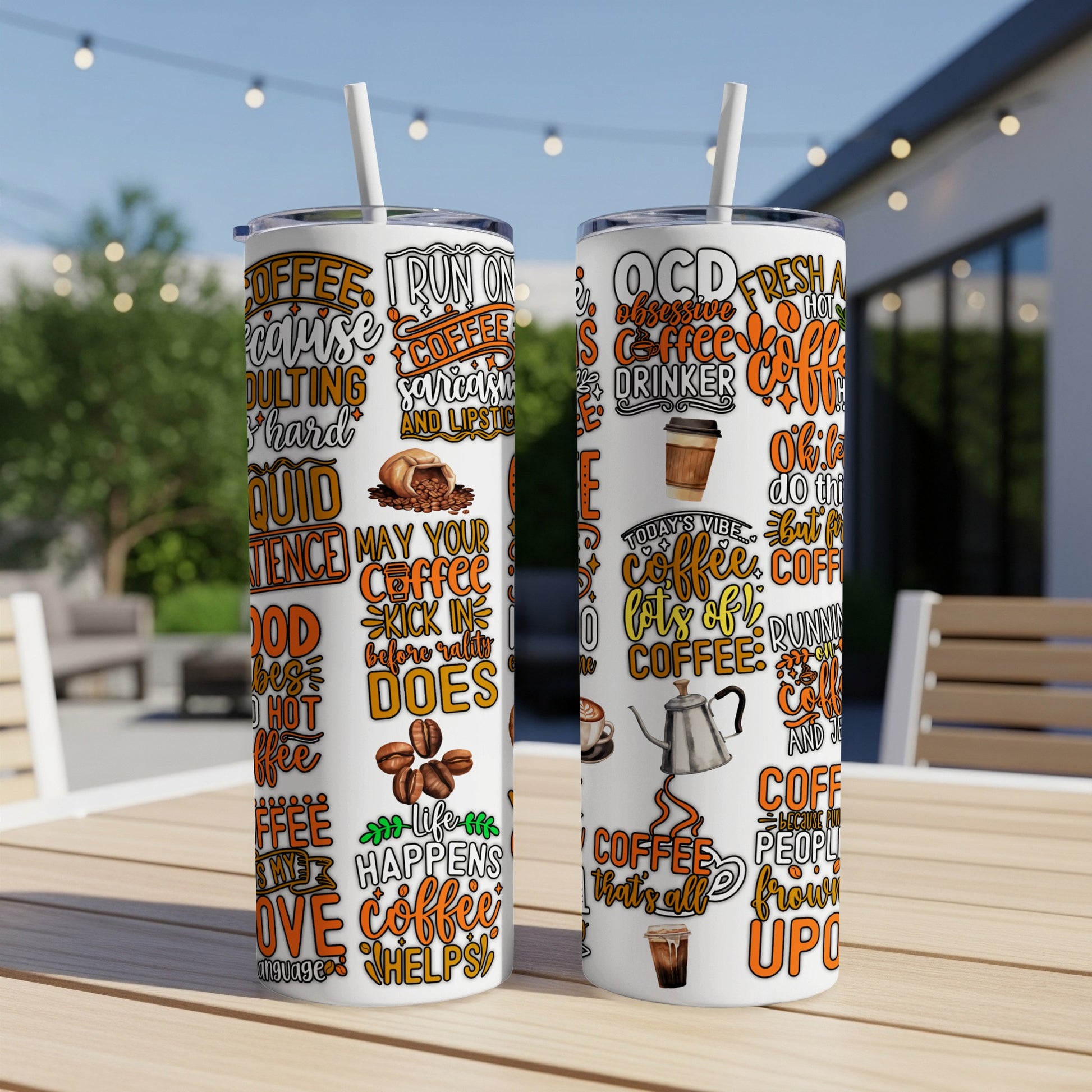 Two tumblers with coffee-themed quotes and graphics on a table.