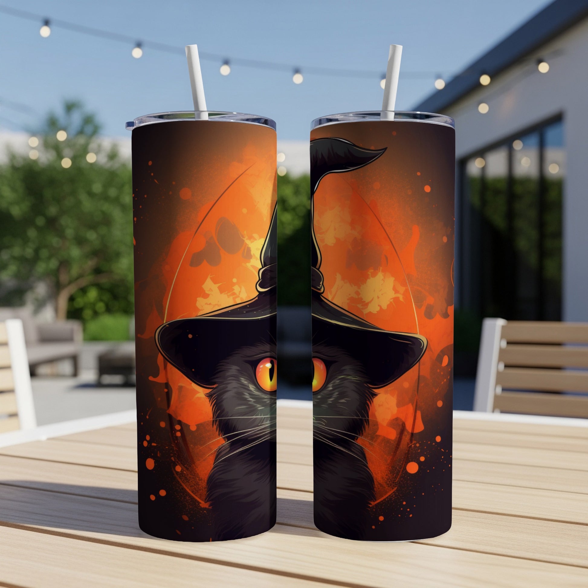 Two tumblers with black cat wearing witch hat and orange watercolor background.