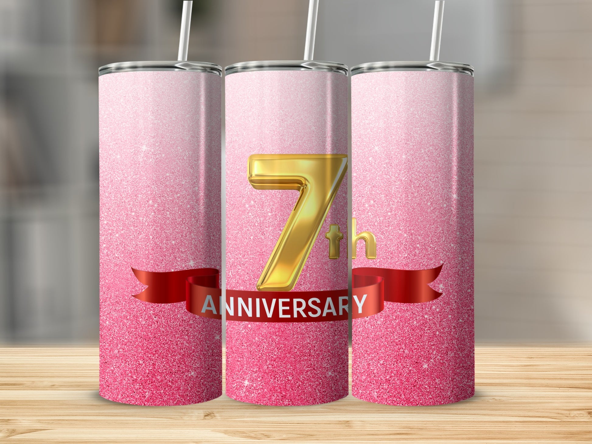Pink glitter tumbler with "7th ANNIVERSARY" on a red ribbon.
