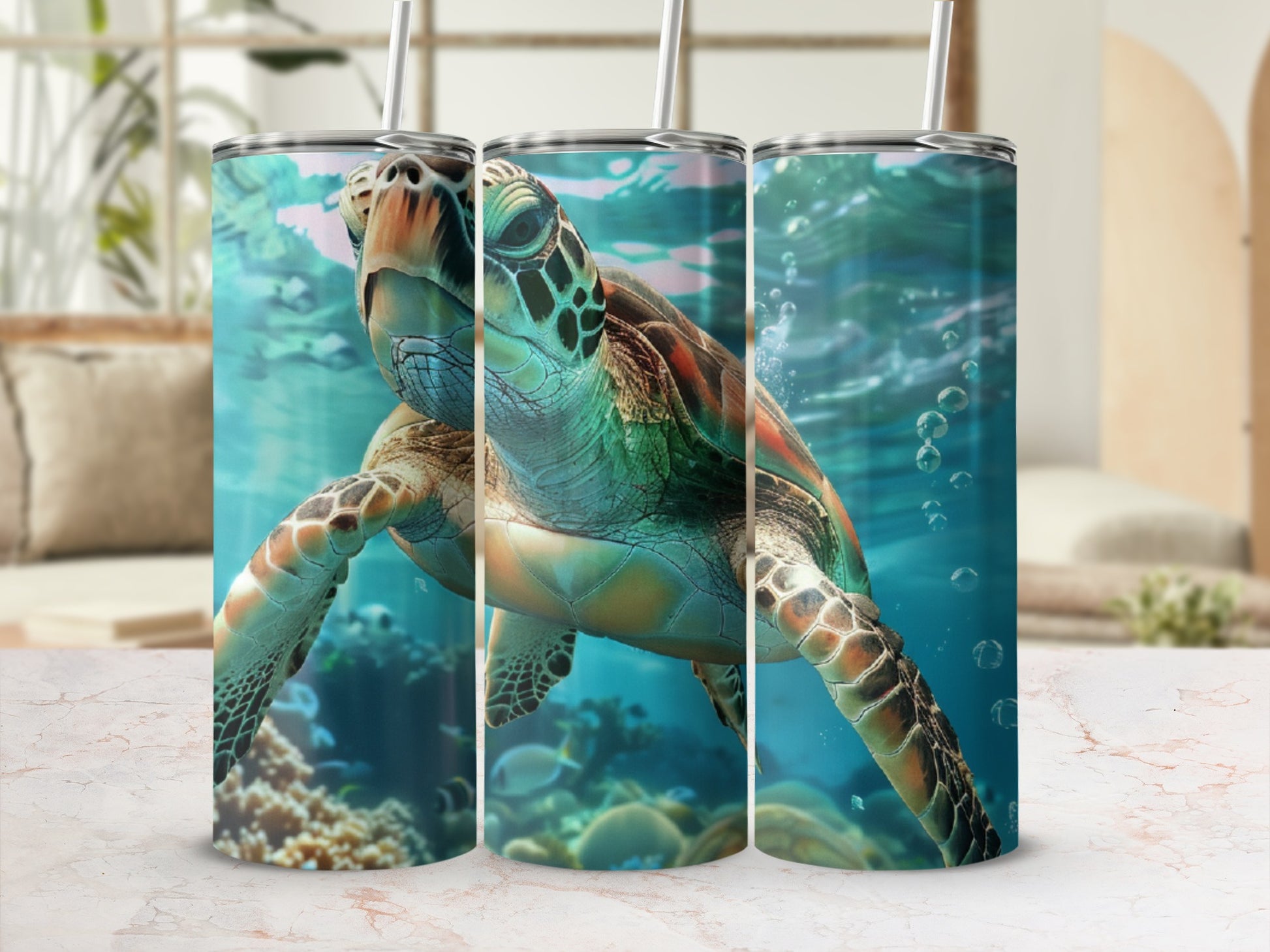 Three tumblers featuring a sea turtle swimming underwater in a coral reef.