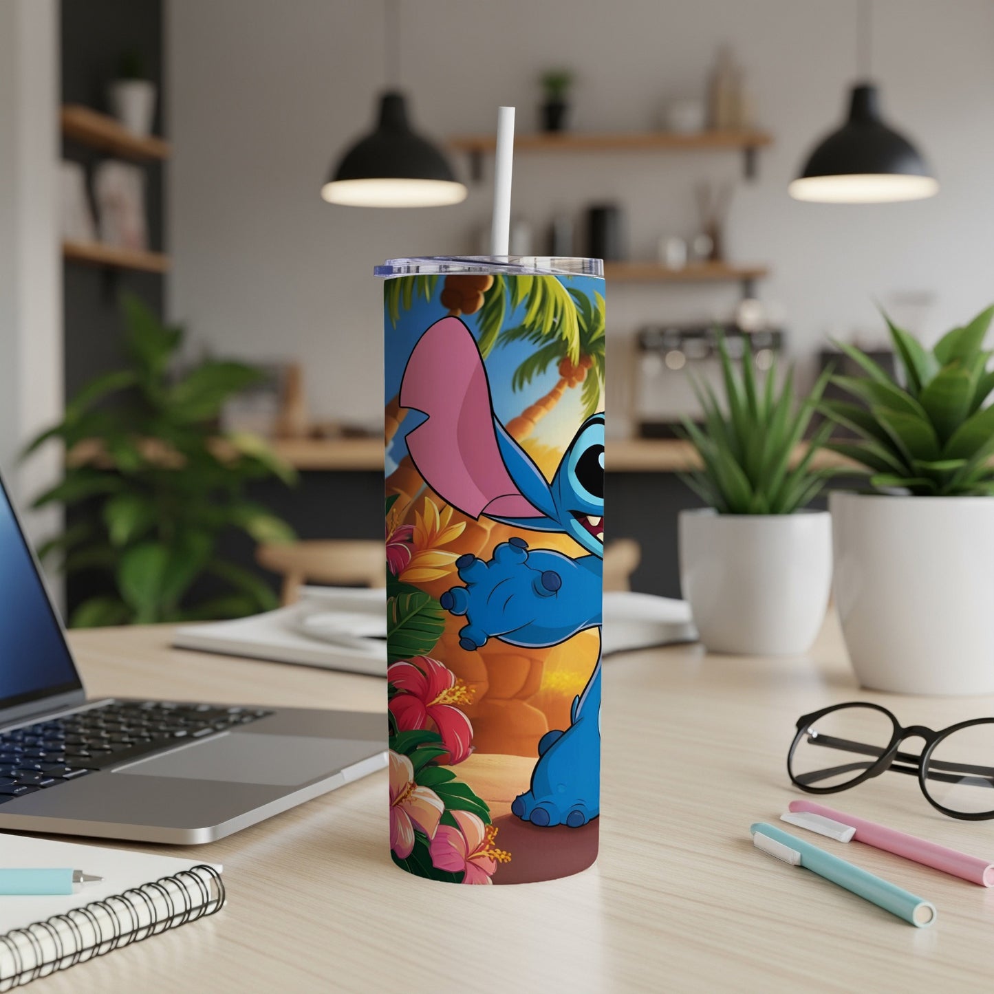Blue alien character Stitch from Lilo & Stitch on a tropical-themed tumbler.