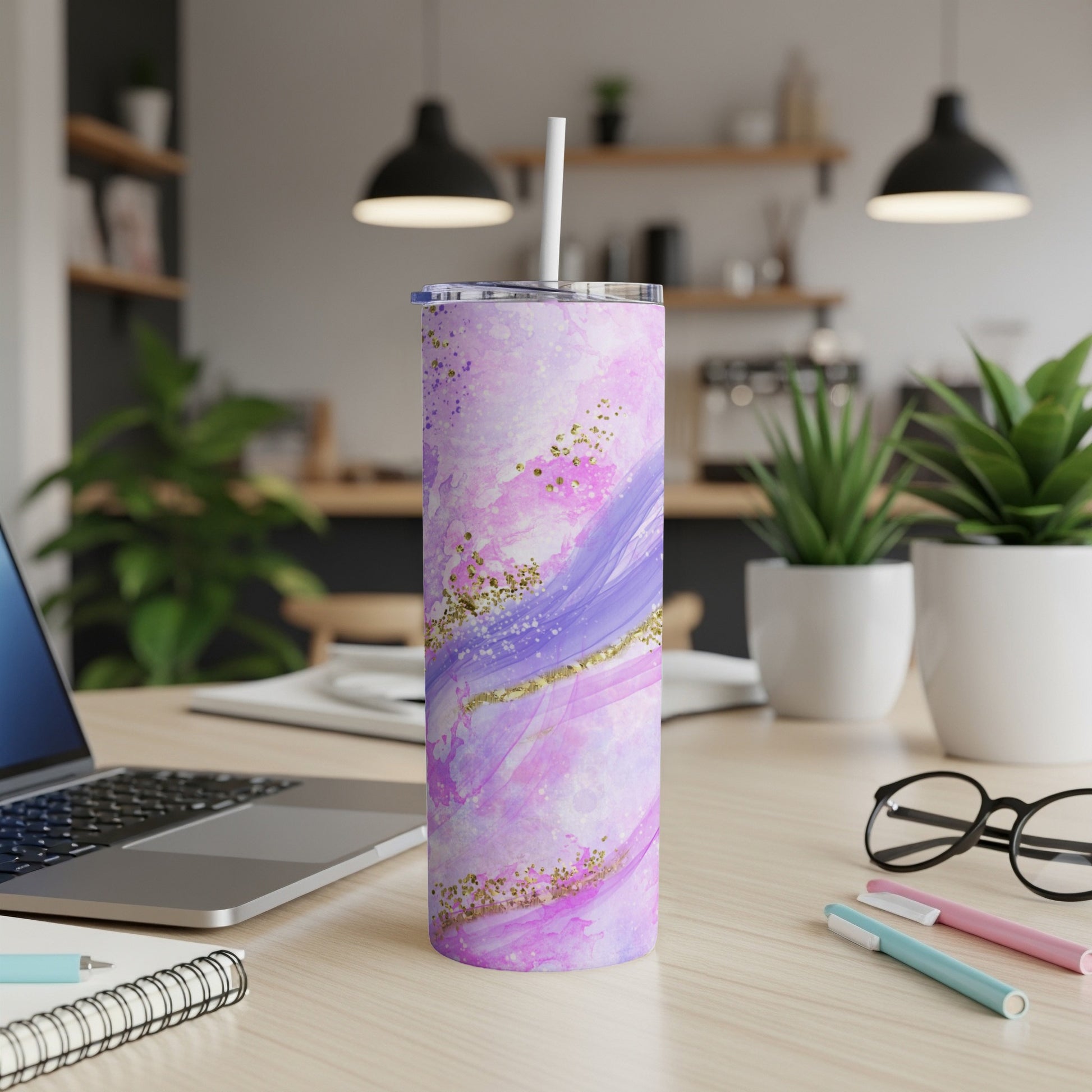 Purple and pink watercolor tumbler with gold glitter accents.
