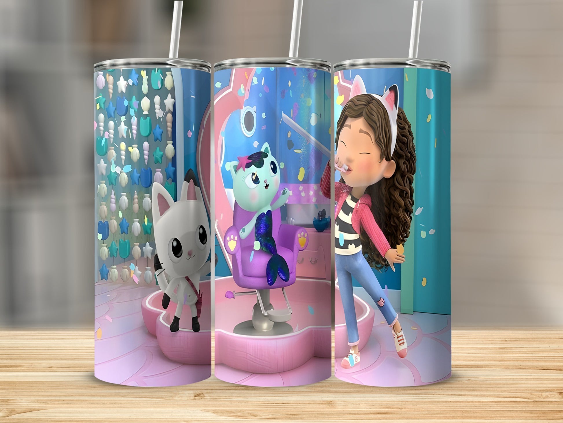 Gabby's Dollhouse characters on a tumbler with pastel stripes and glitter accents.