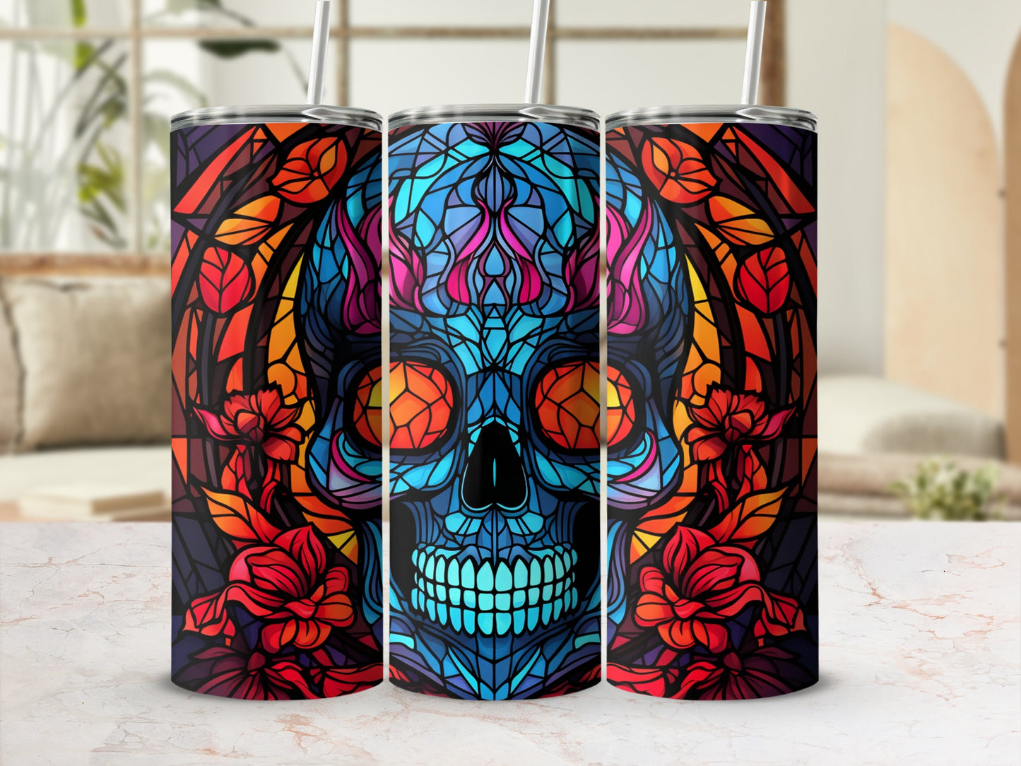 Three stained-glass tumblers featuring a skull with flames and floral designs.