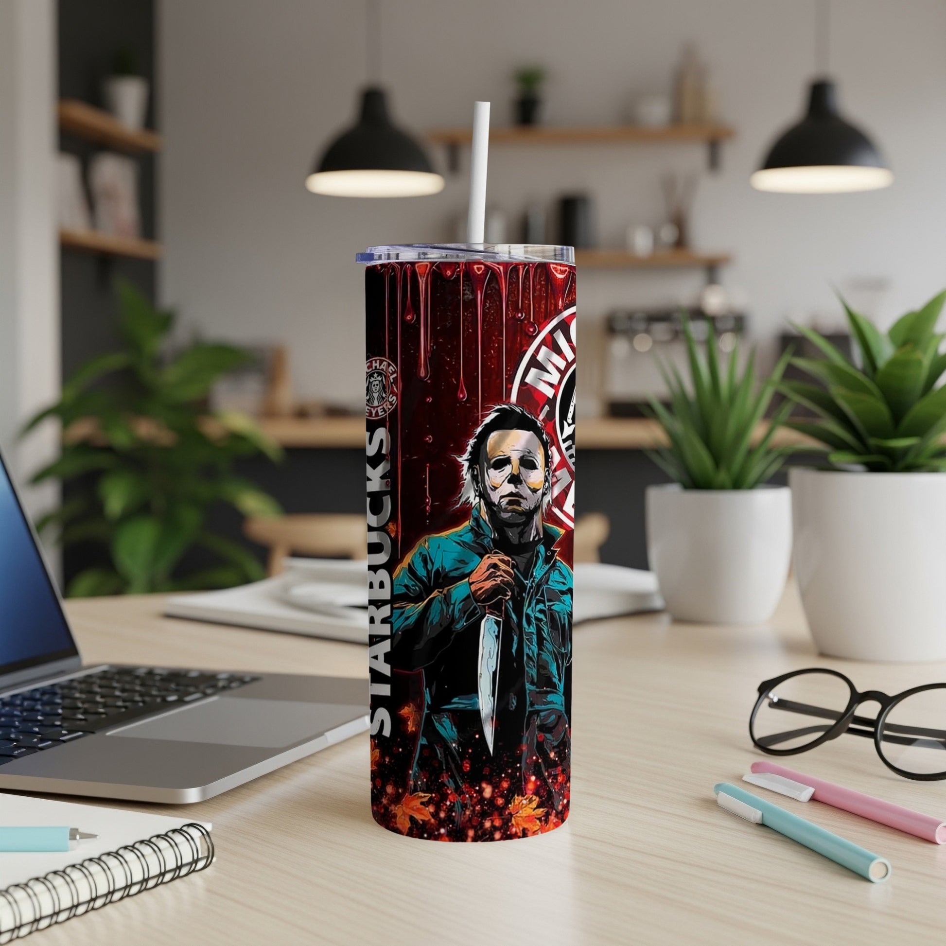 Michael Myers Halloween tumbler with Starbucks logo and fallen leaves.