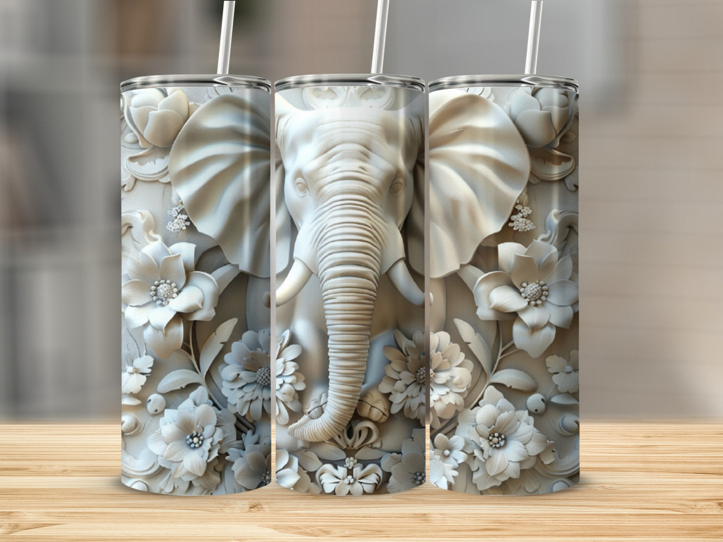 White embossed elephant and floral design on a three-panel tumbler.