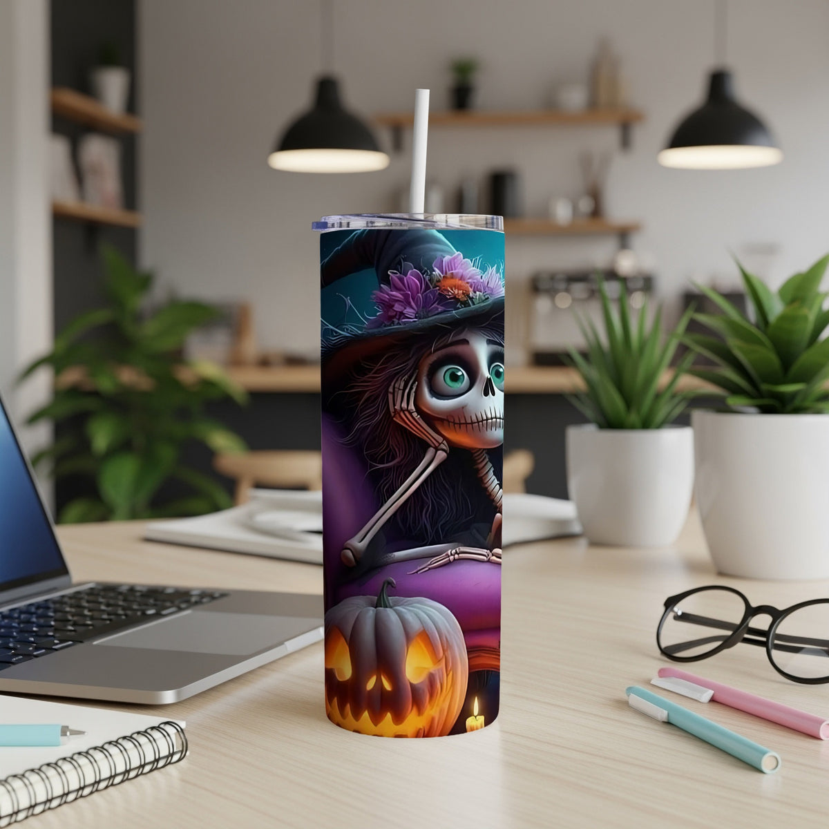 Tumbler with skeleton wearing a witch hat and holding flowers, beside a jack-o'-lantern.