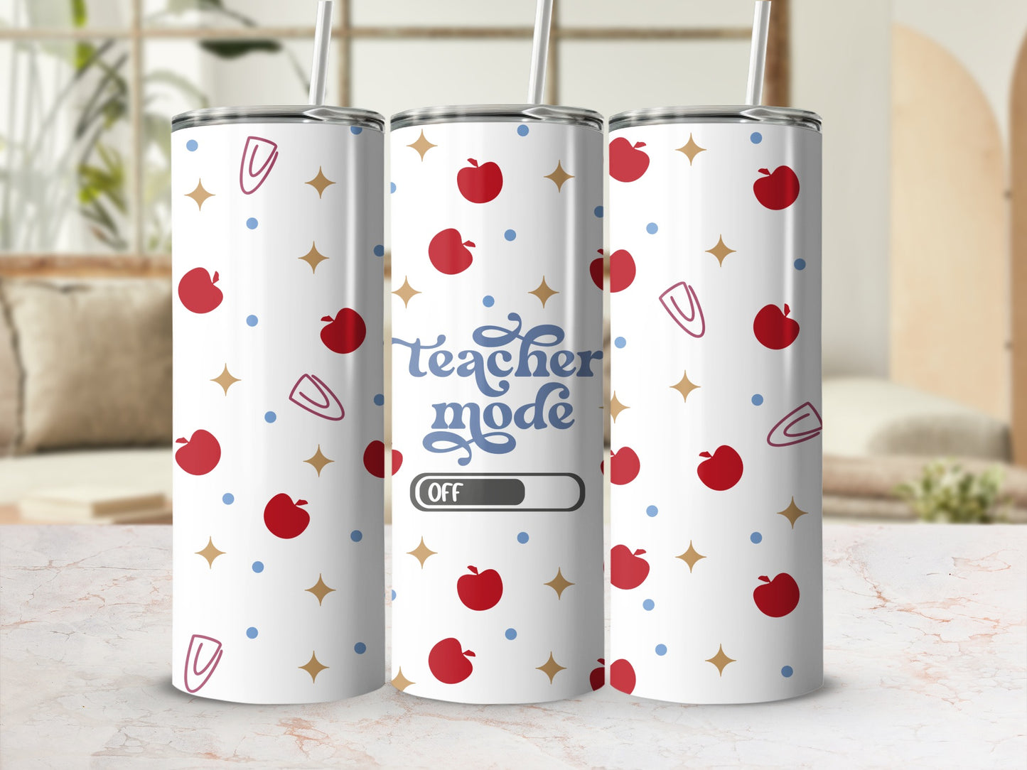 Teacher mode activated tumbler with apples and stars pattern.