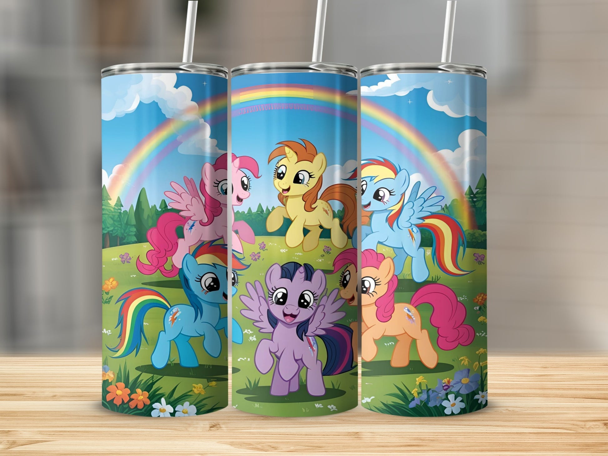 My Little Pony characters on a colorful tumbler with a rainbow and grass background.