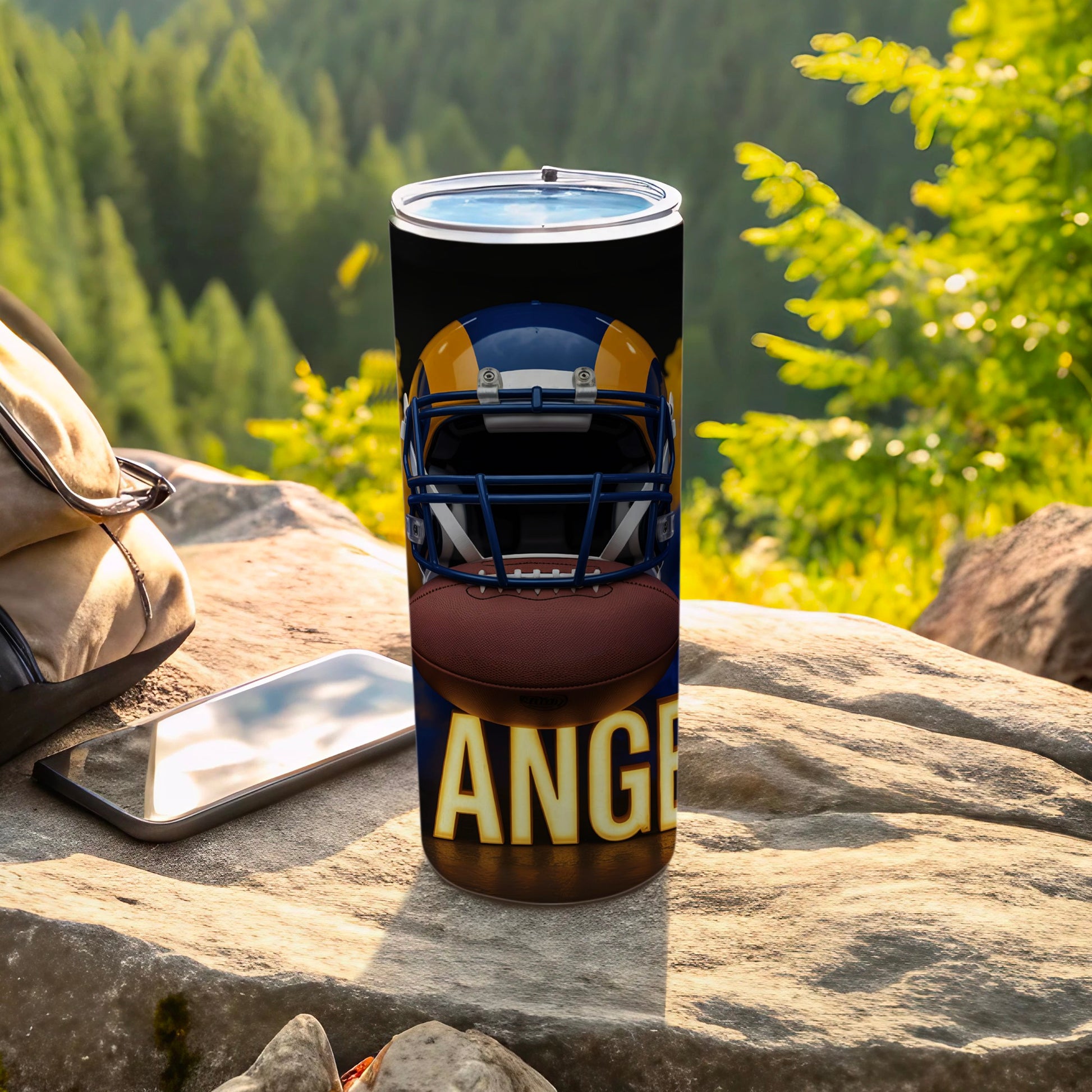 Los Angeles Rams helmet and football on a tumbler.