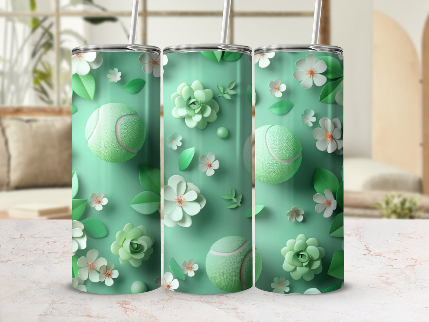 Green tumbler with floral and tennis ball pattern.
