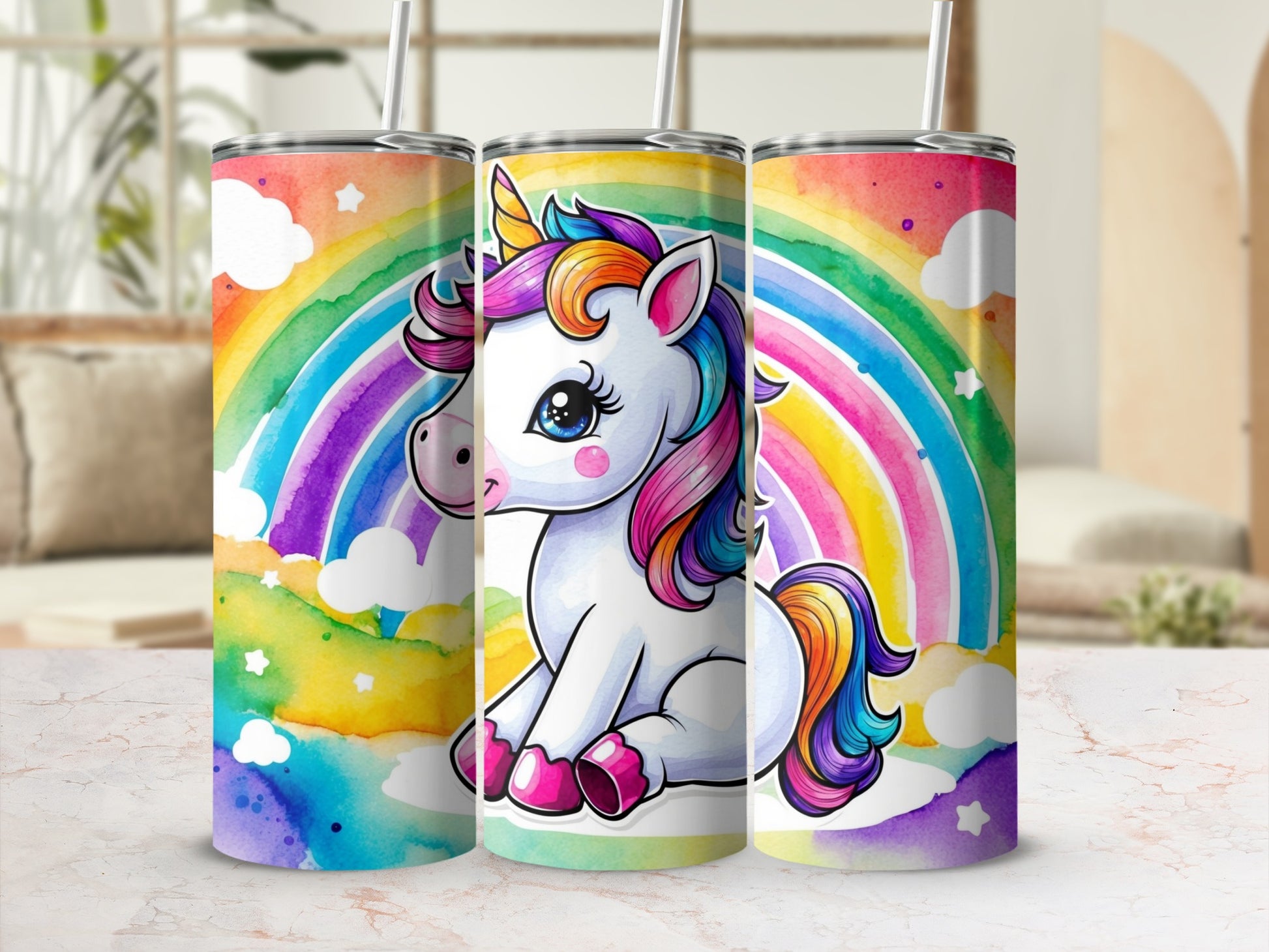 Watercolor unicorn with rainbow and clouds on three tumblers.