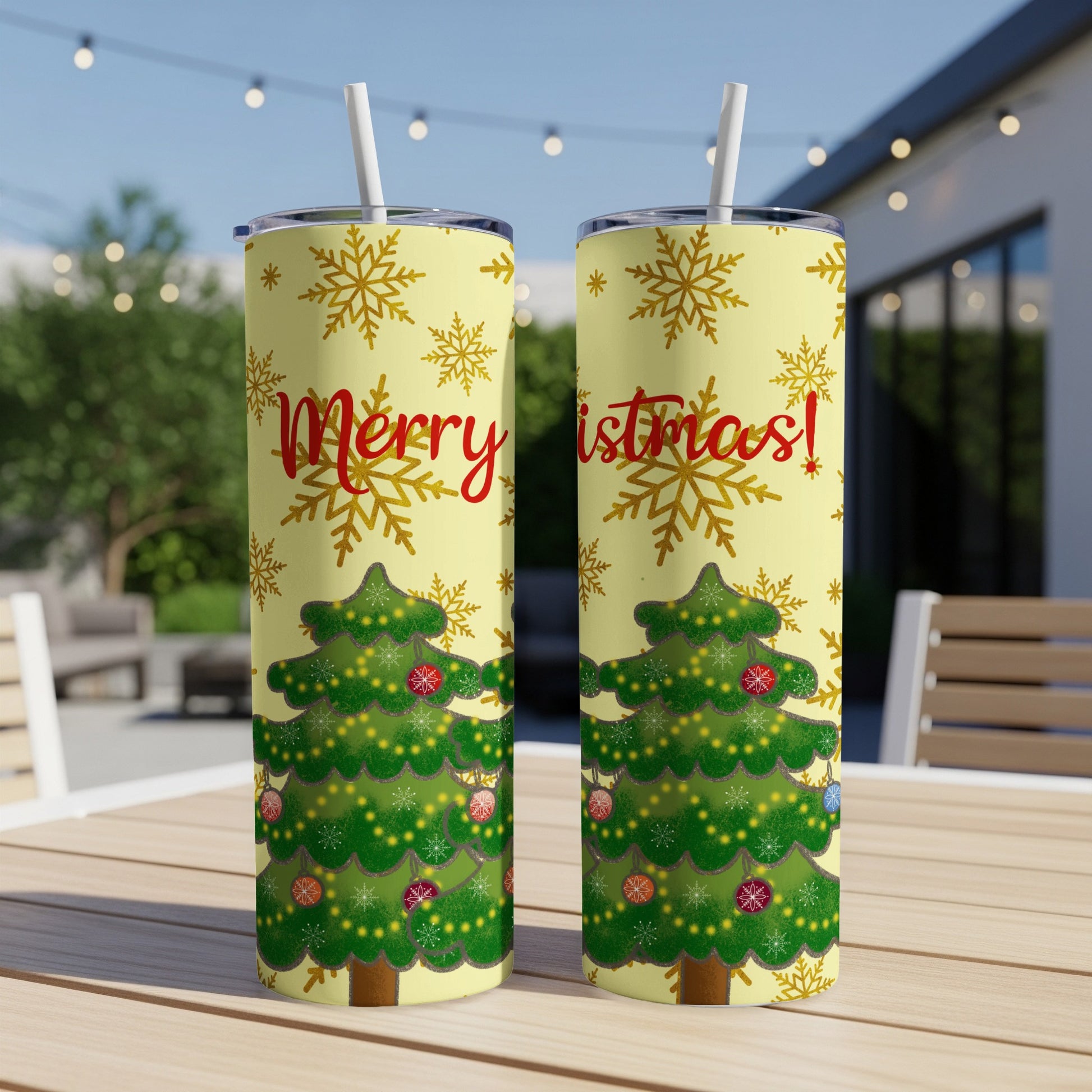 Yellow tumbler with Christmas tree and snowflakes, "Merry Christmas!" text.