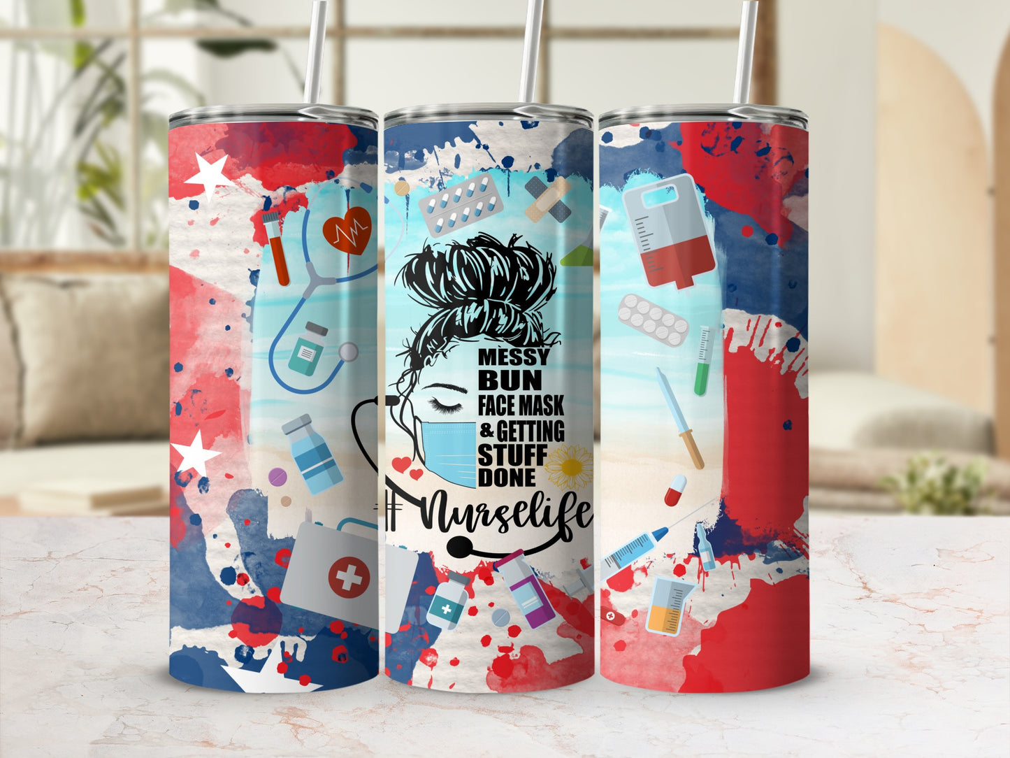 Red, white, and blue tumbler with nurse graphics and text "Messy bun face mask & getting stuff done #Nurselife".