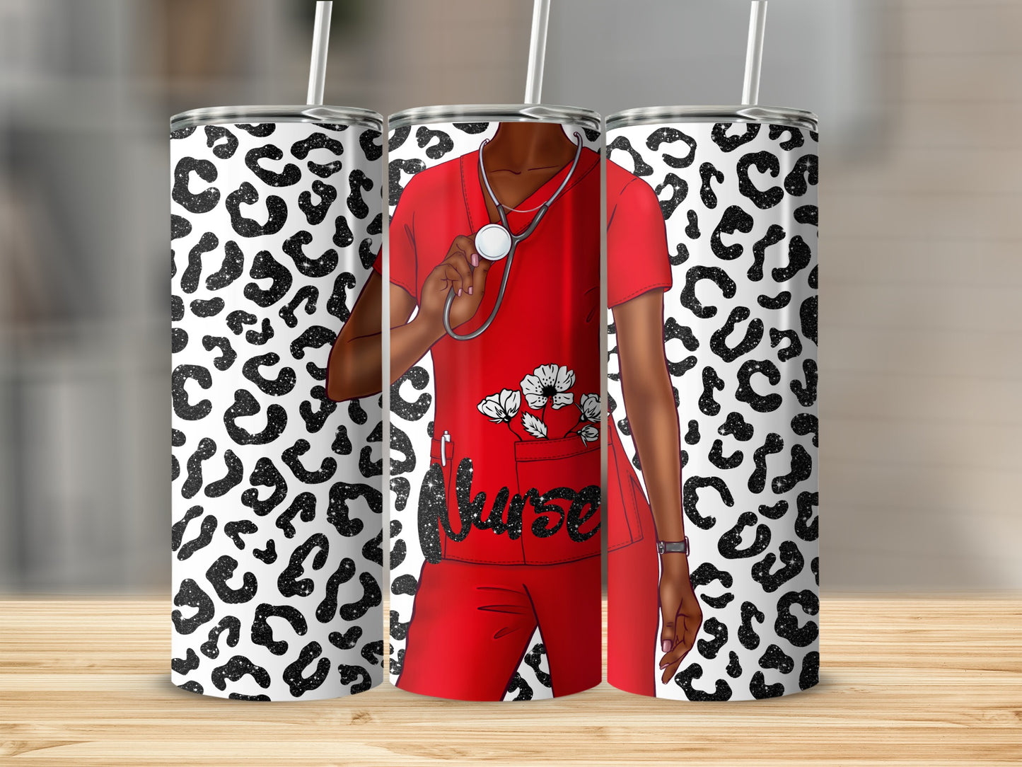 Red scrub nurse with stethoscope and leopard print tumbler cups.