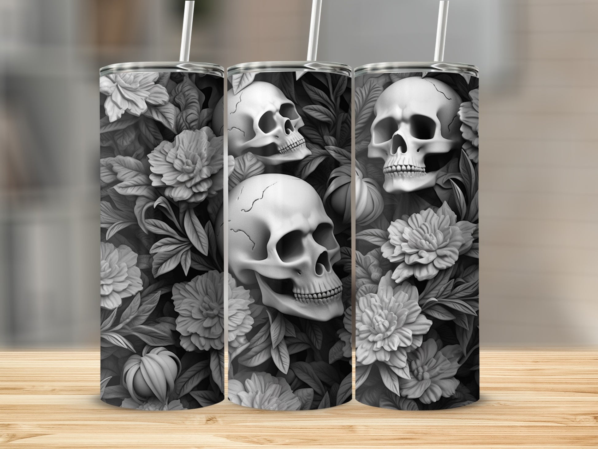 Three tumblers with skull and floral monochrome pattern.