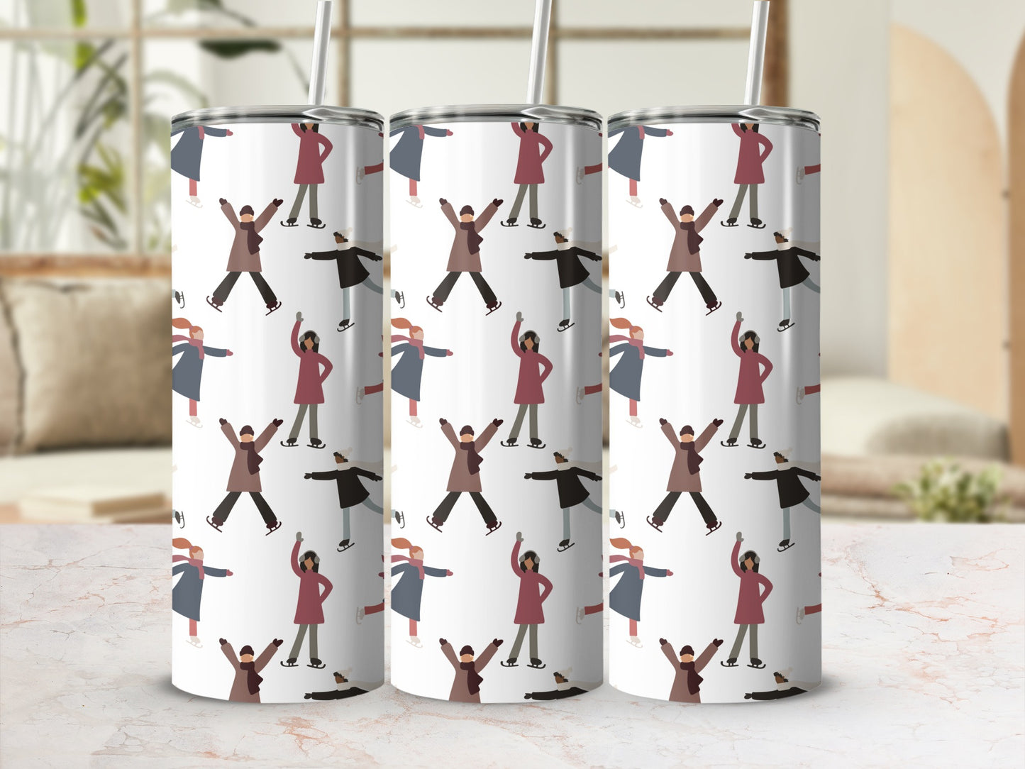 Three tumblers with a repeating pattern of ice skaters.