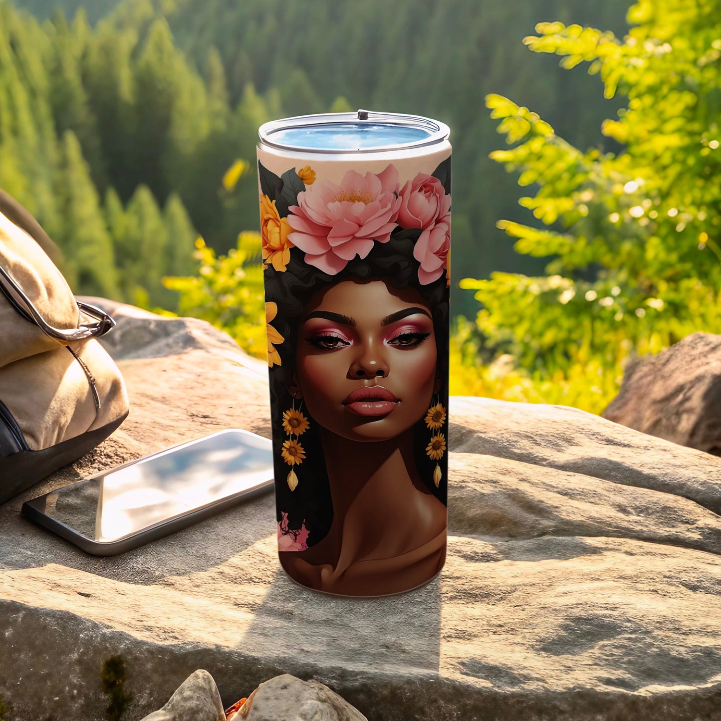 Tumbler featuring a woman with a floral crown and large earrings.