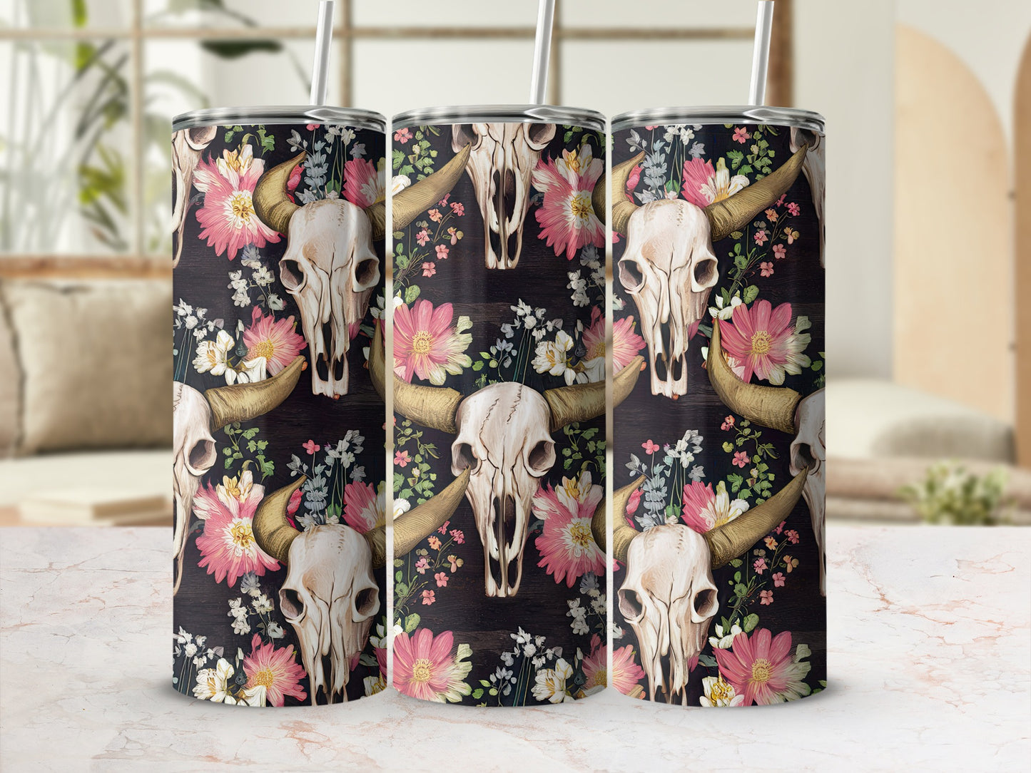 Tumbler with cow skull and floral pattern on dark wood background.